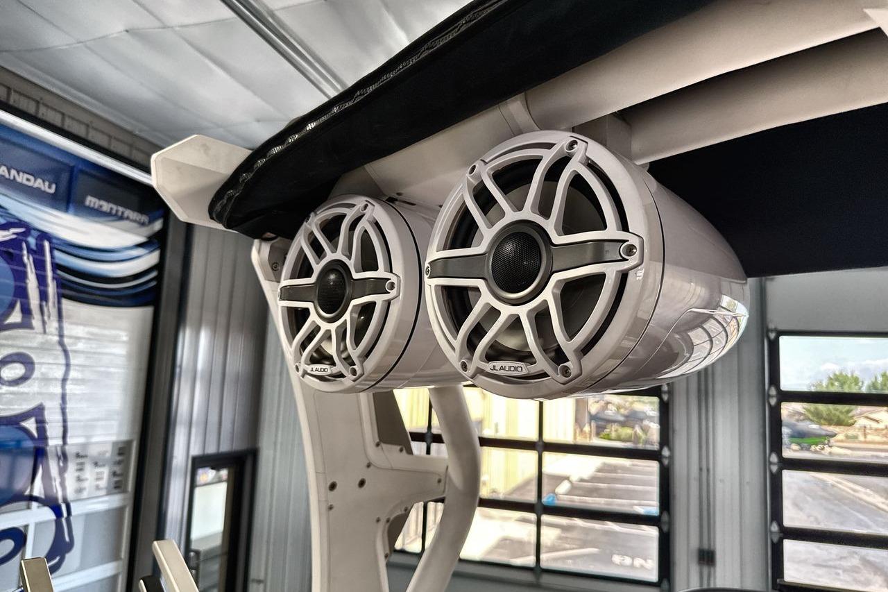 2020 Supra SE boat with JL Audio speakers in a garage setting.
