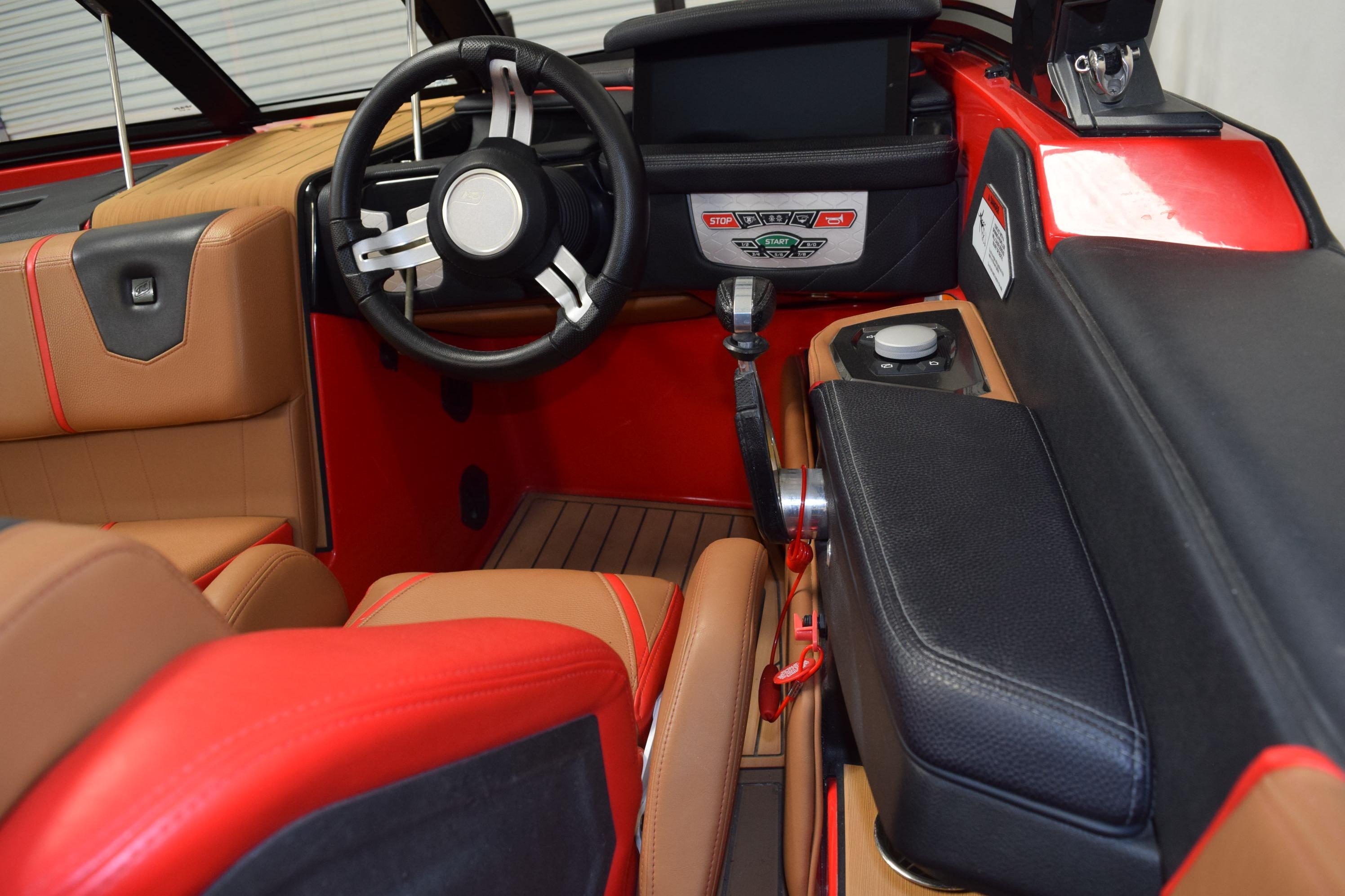 2024 Nautique Ski Nautique interior with modern dashboard and steering wheel design.