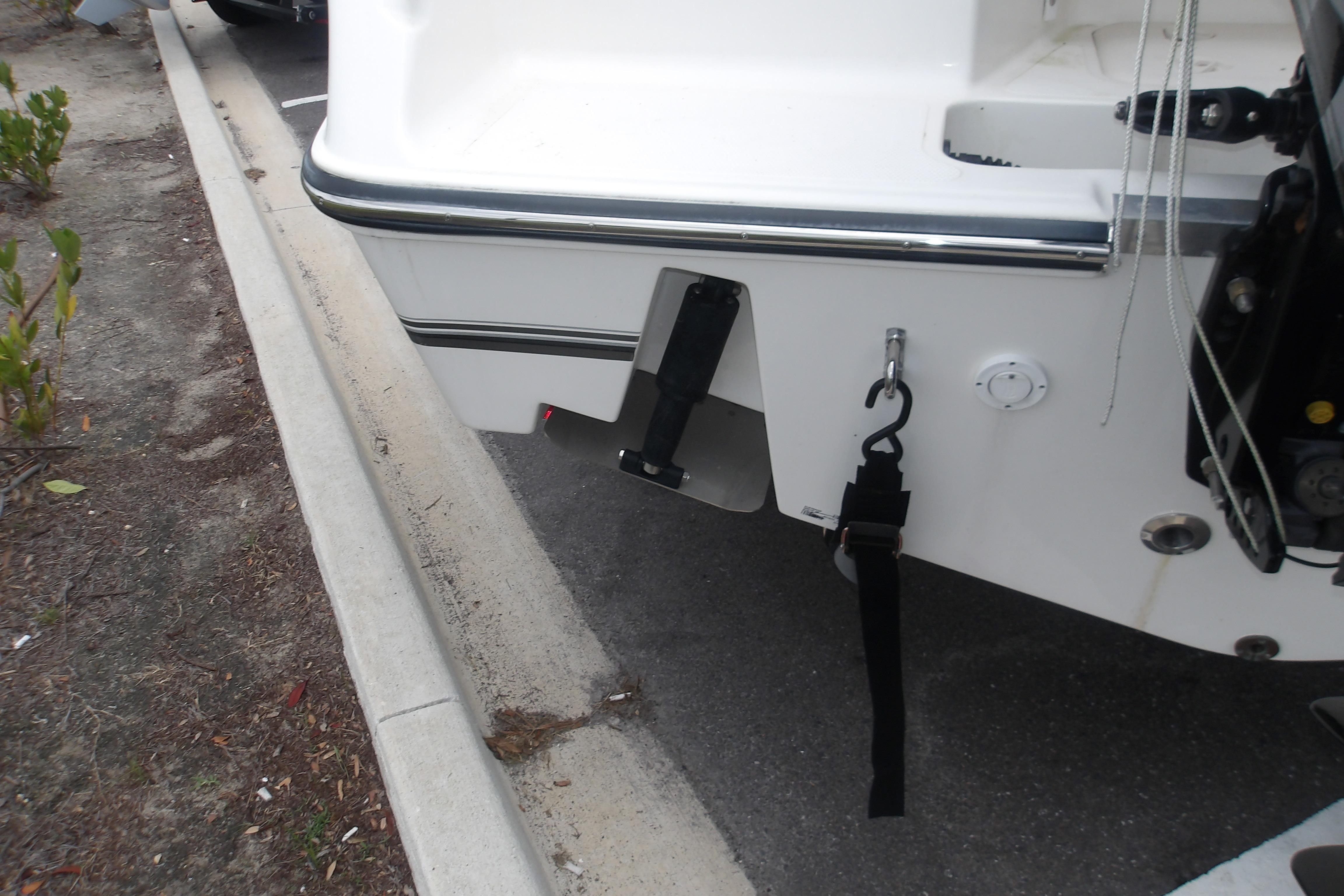 2025 Mako 214 Center Console boat stern with trailer straps and hardware.