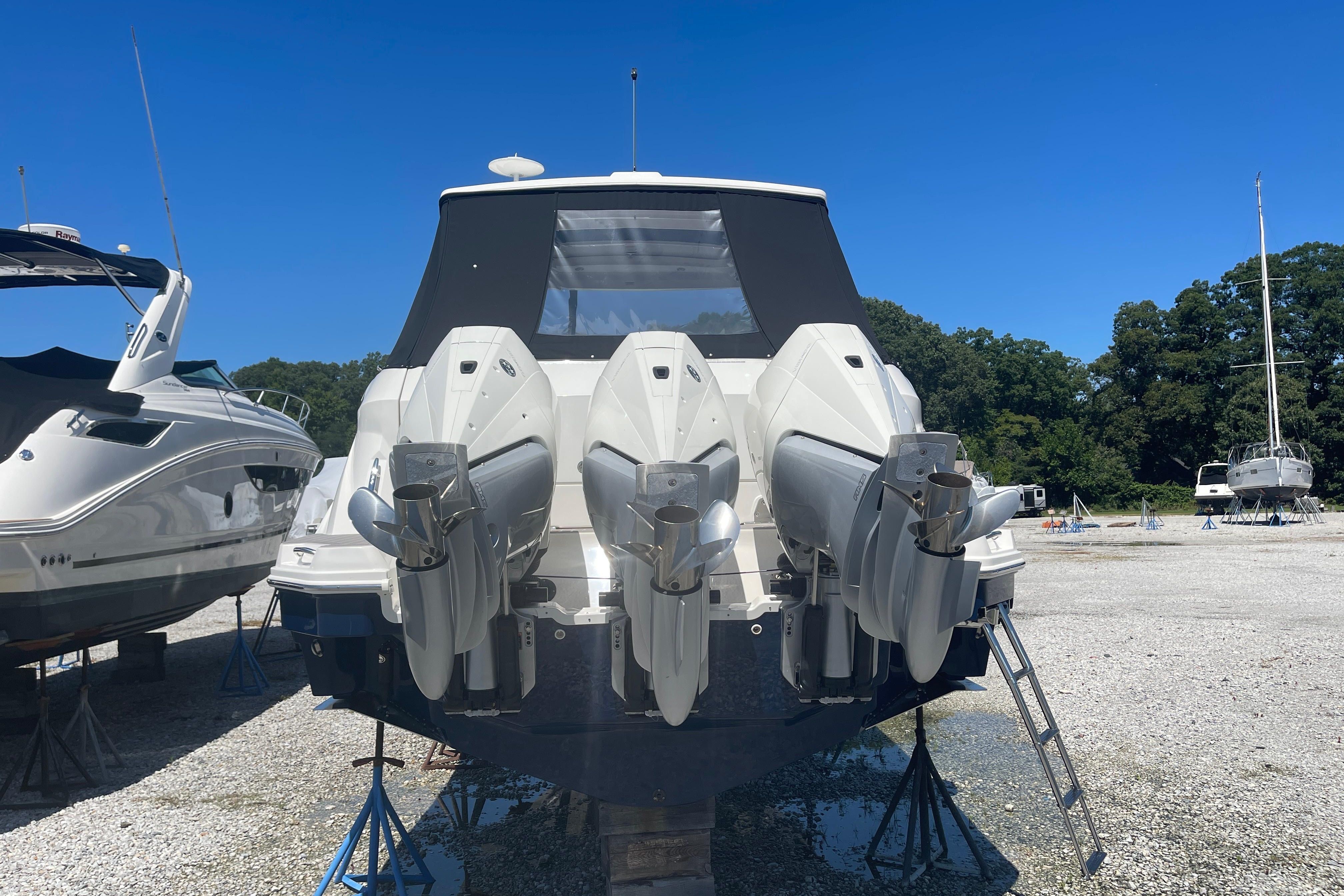 2023 Sea Ray Sundancer 320 Outboard on a boatyard.