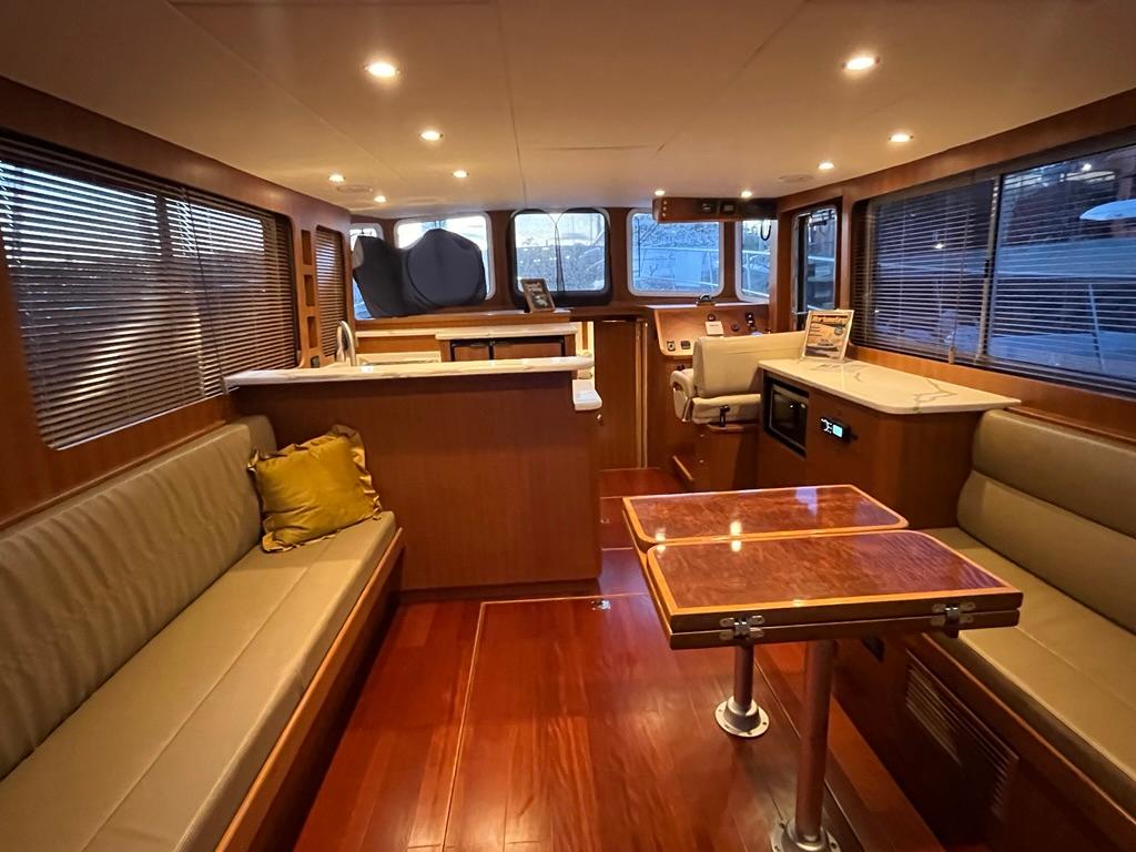 Luxurious interior of 2025 Bracewell 41 yacht with elegant wood finishes and modern amenities.