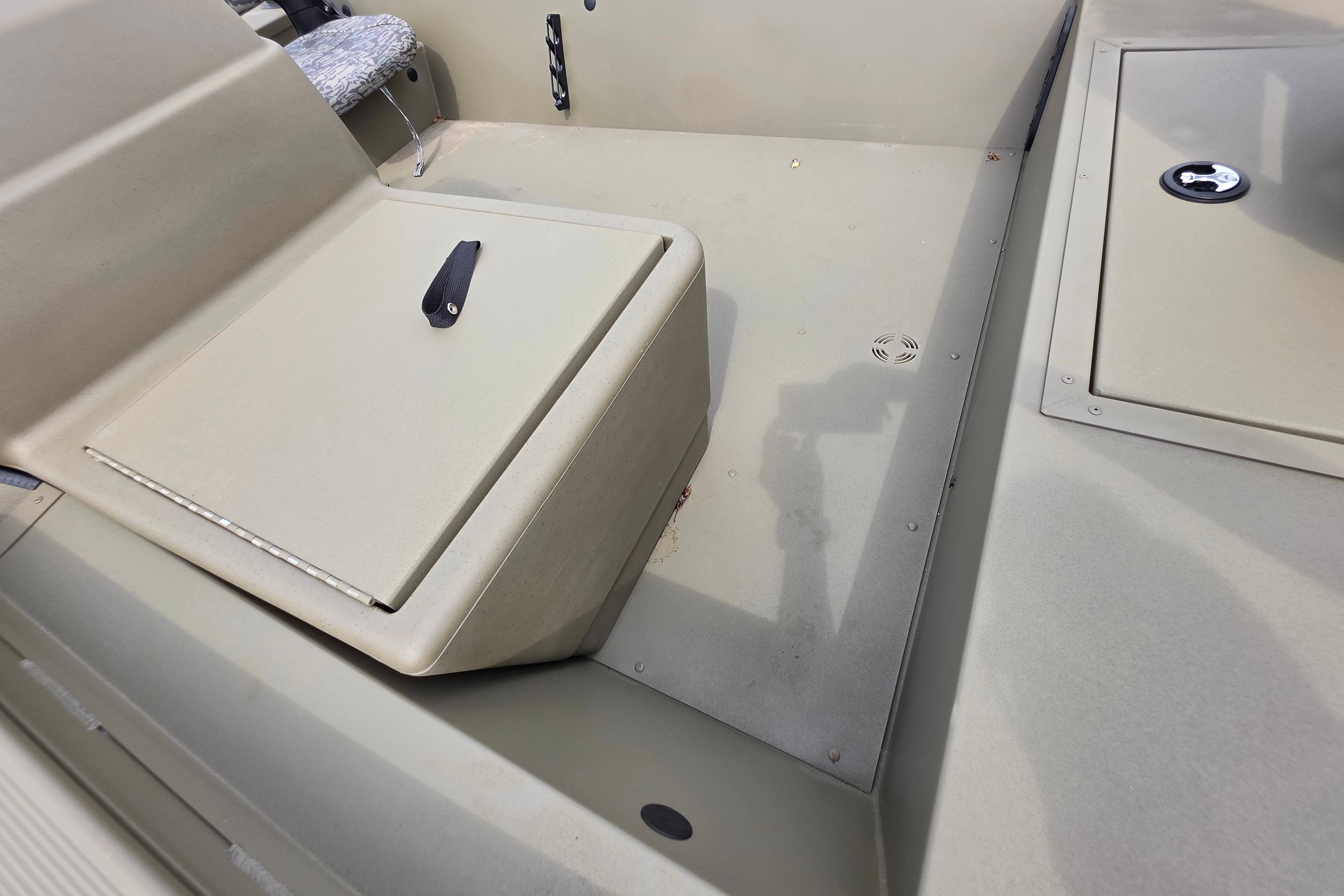 2026 Tracker Grizzly 1754 SC boat interior with storage compartments and seating.