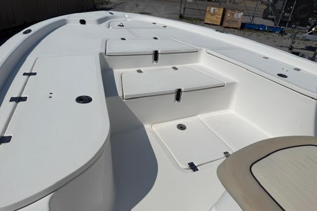 2016 Sea Fox 240 Viper boat interior with storage compartments and seating.