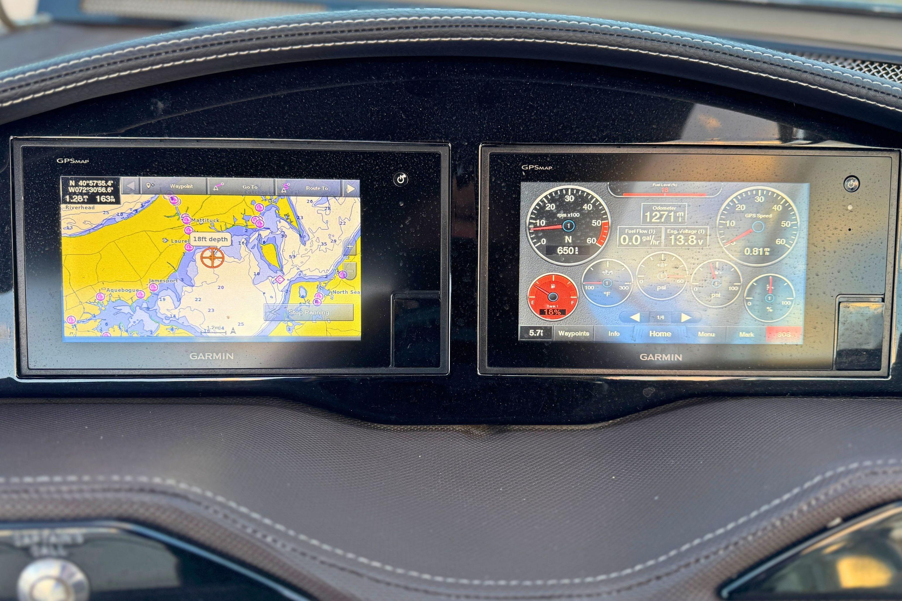 Dashboard of a 2019 Cobalt R3 boat with Garmin navigation displays.