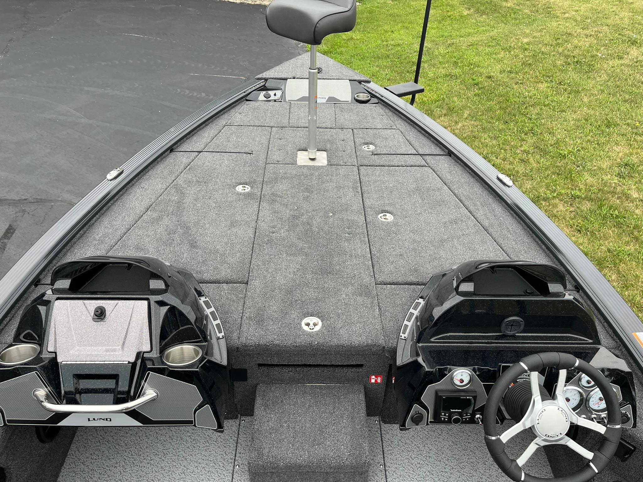 2026 Lund 1875 Pro-V Bass XS boat interior with dual consoles and steering wheel.