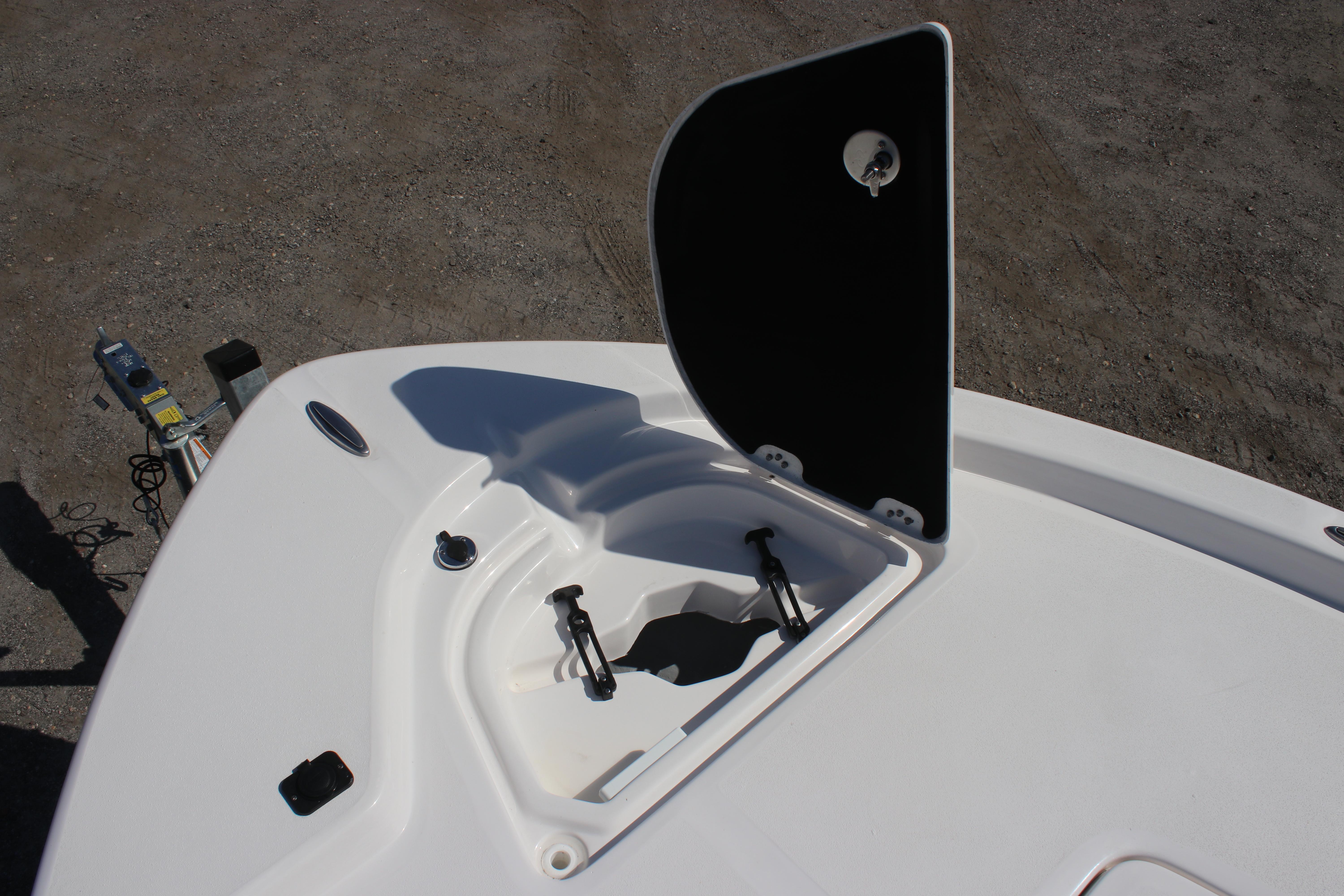 2025 Sea Fox 251 Bay Fox boat with open storage compartment on deck.