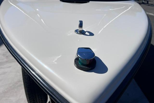 1996 MasterCraft ProStar 190 boat bow with navigation light and cleat.