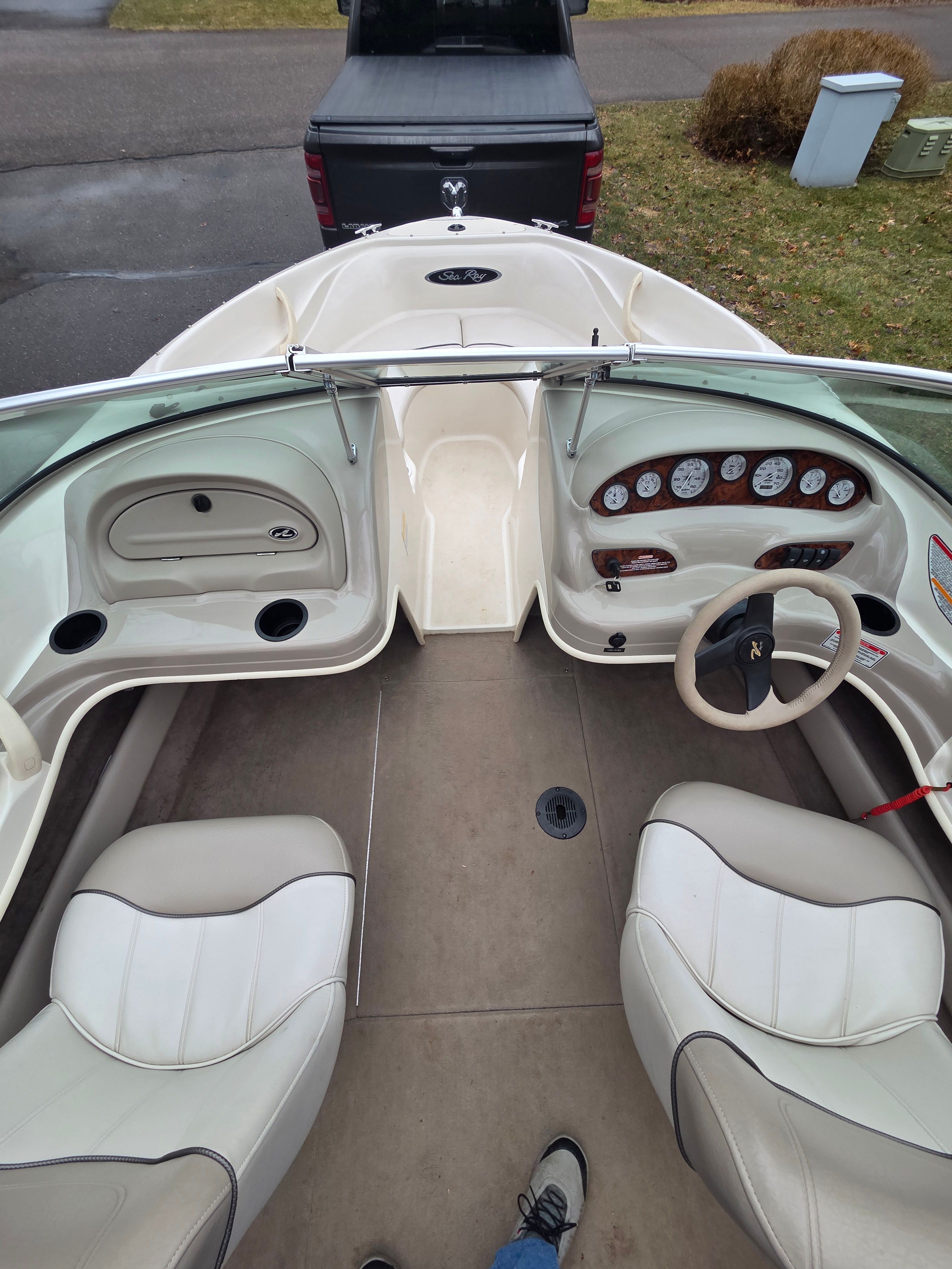 Interior view of a 2002 Sea Ray 182 boat with steering console.