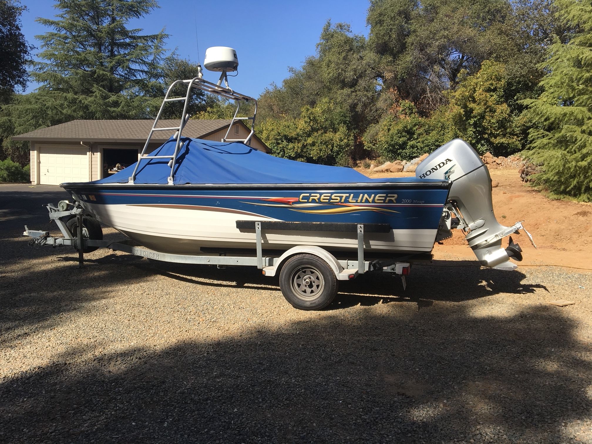 2007 Crestliner Mirage 2000 boat with Honda outboard motor.