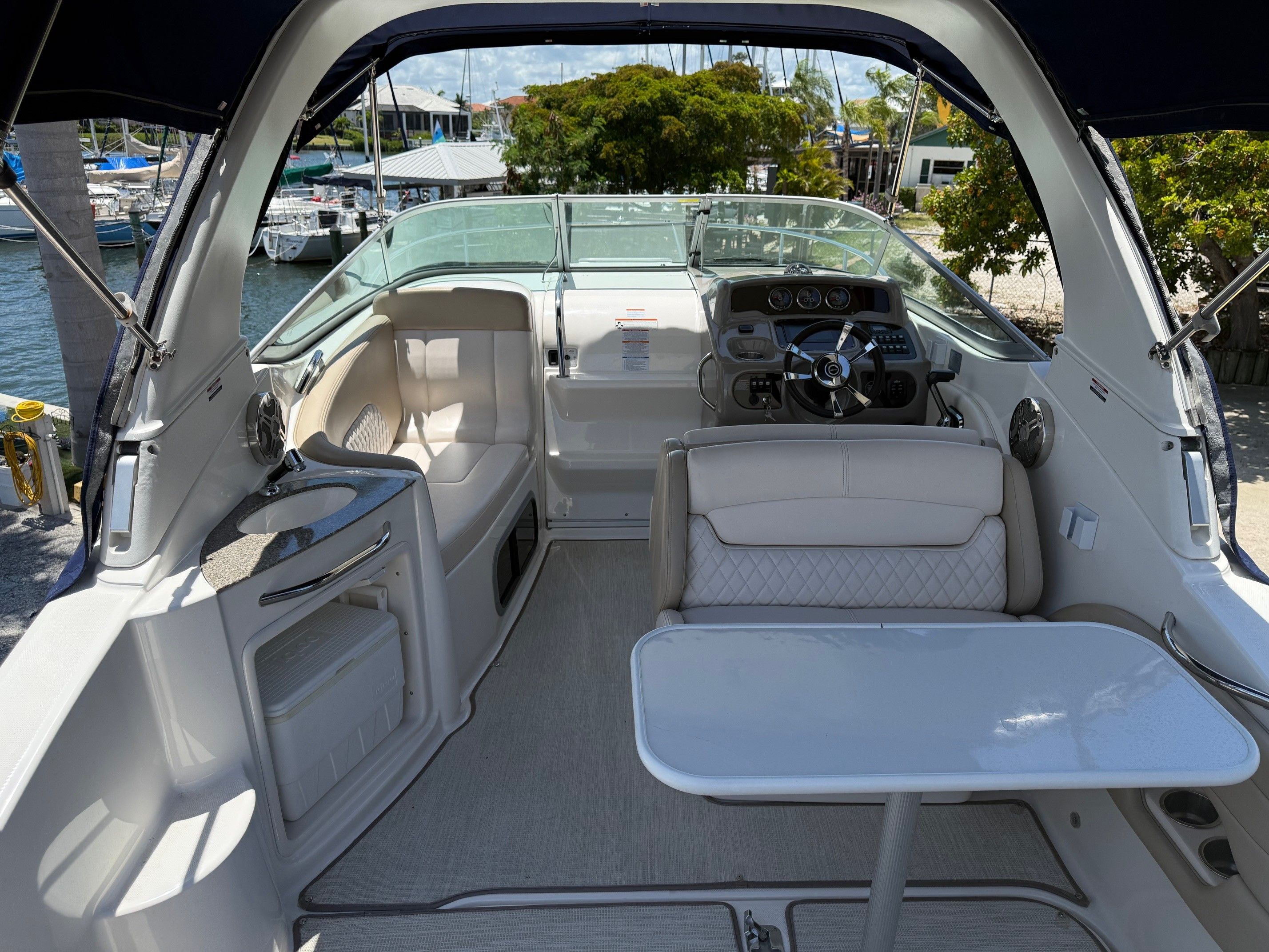 Interior of a 2018 Chaparral 270 Signature boat at the dock.
