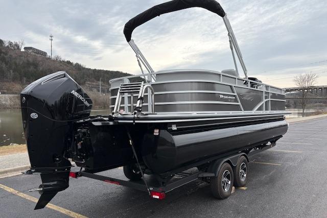 2025 Ranger Reata 243C pontoon boat on trailer, featuring sleek design and powerful Mercury outboard.