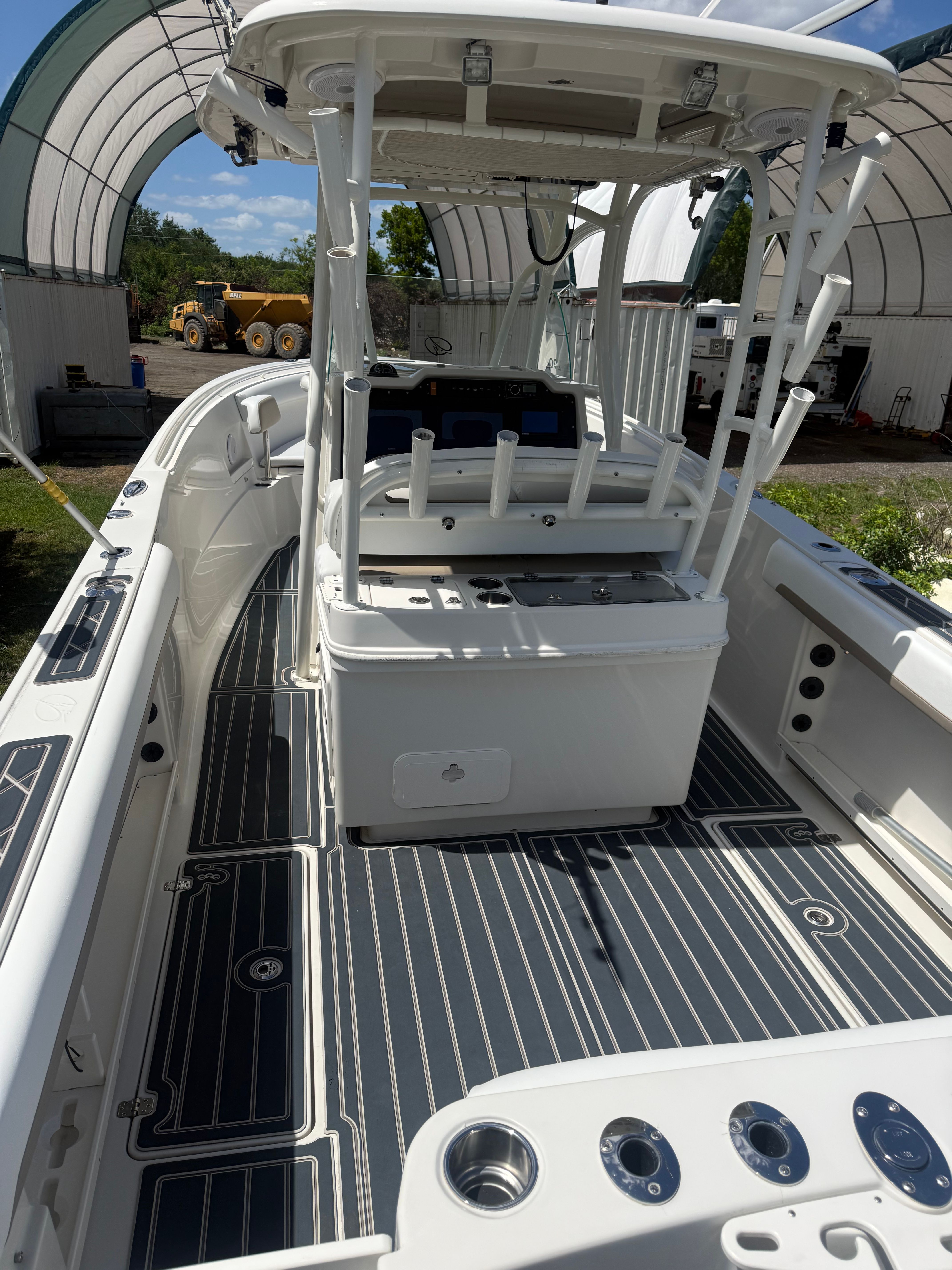 Interior view of a 2015 Sailfish 290 CC boat at dock.