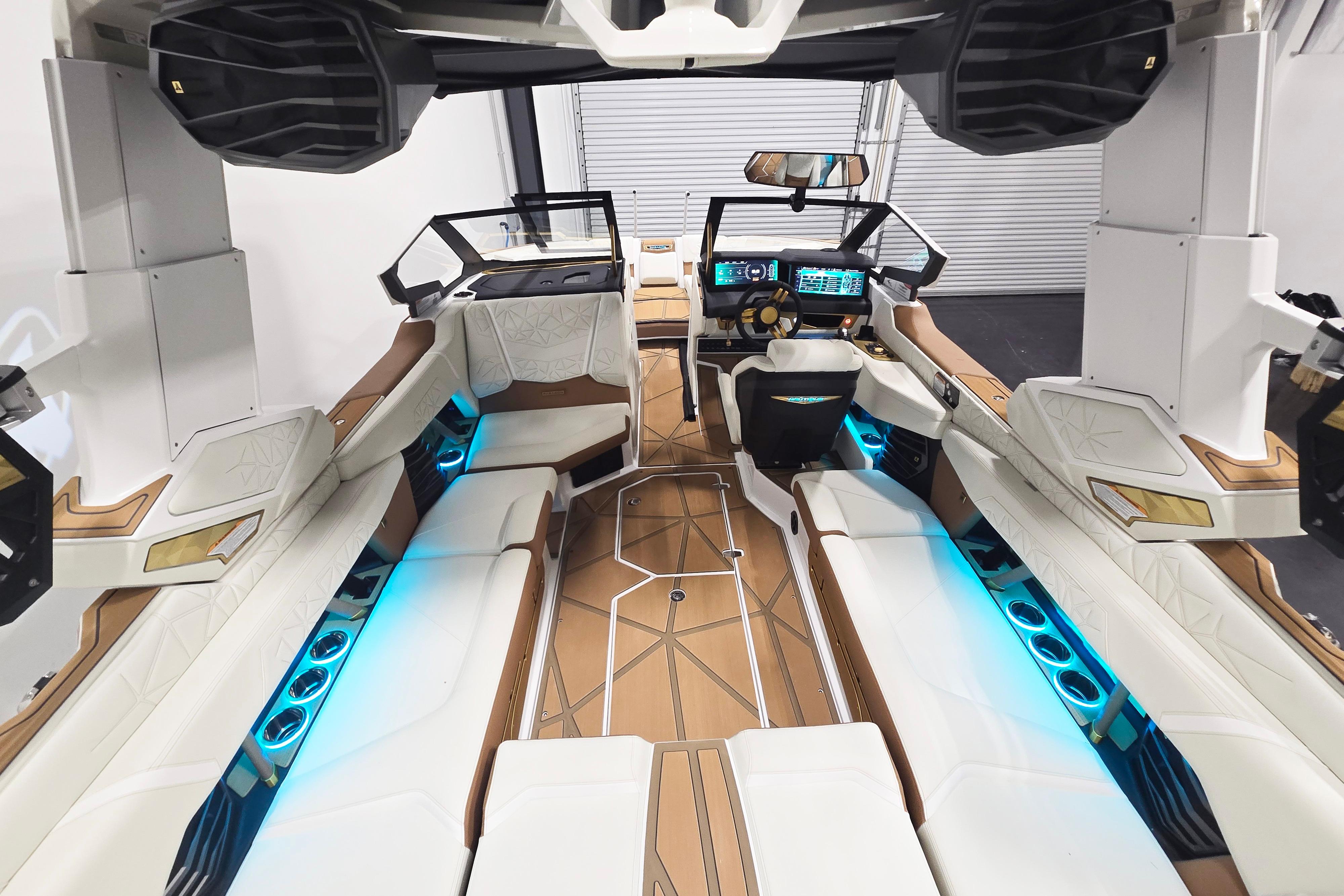 Luxurious interior of 2026 Nautique Super Air Nautique G23 Paragon with ambient lighting.