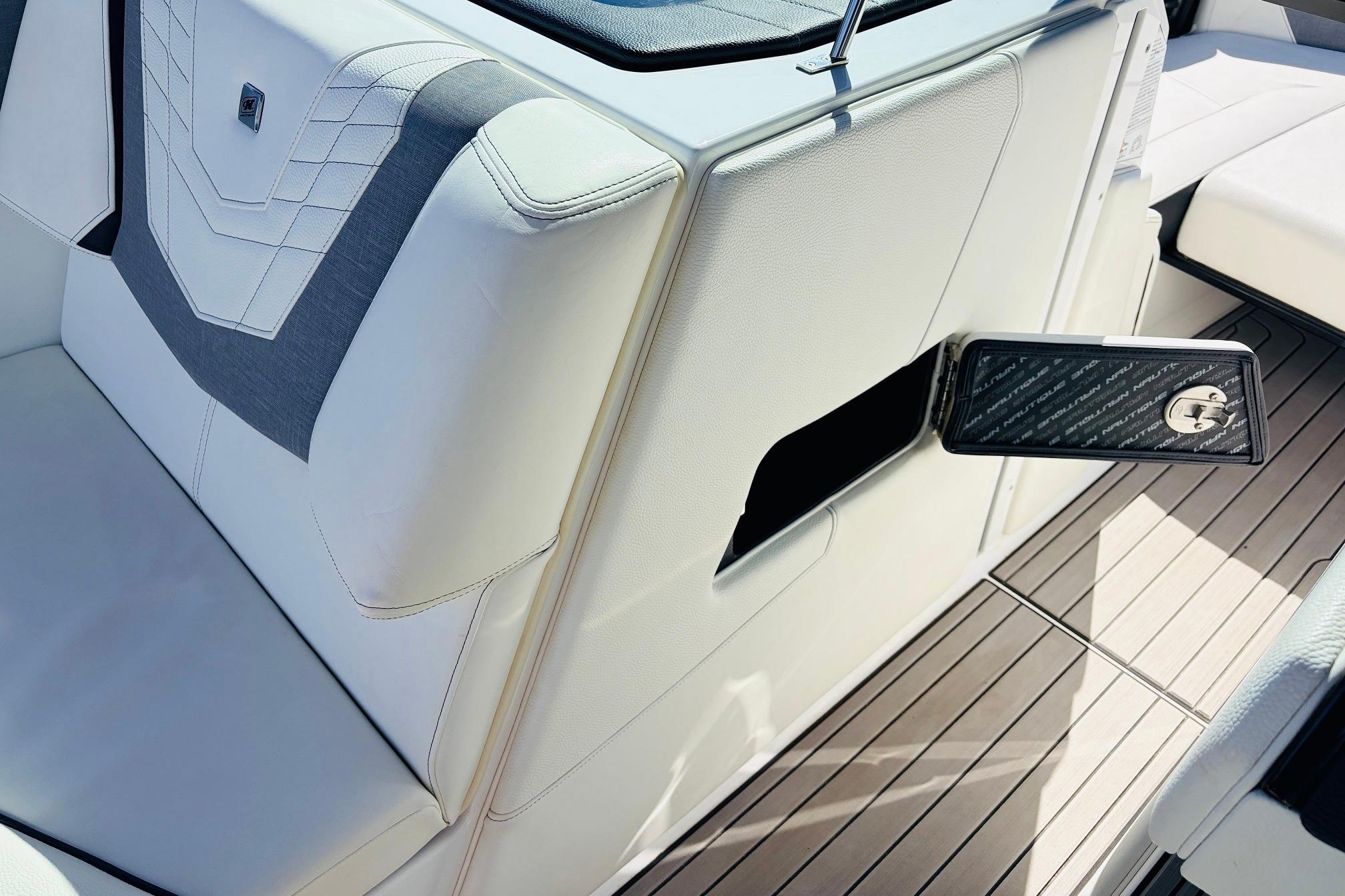 2023 Nautique Super Air Nautique G25 interior with open storage compartment.