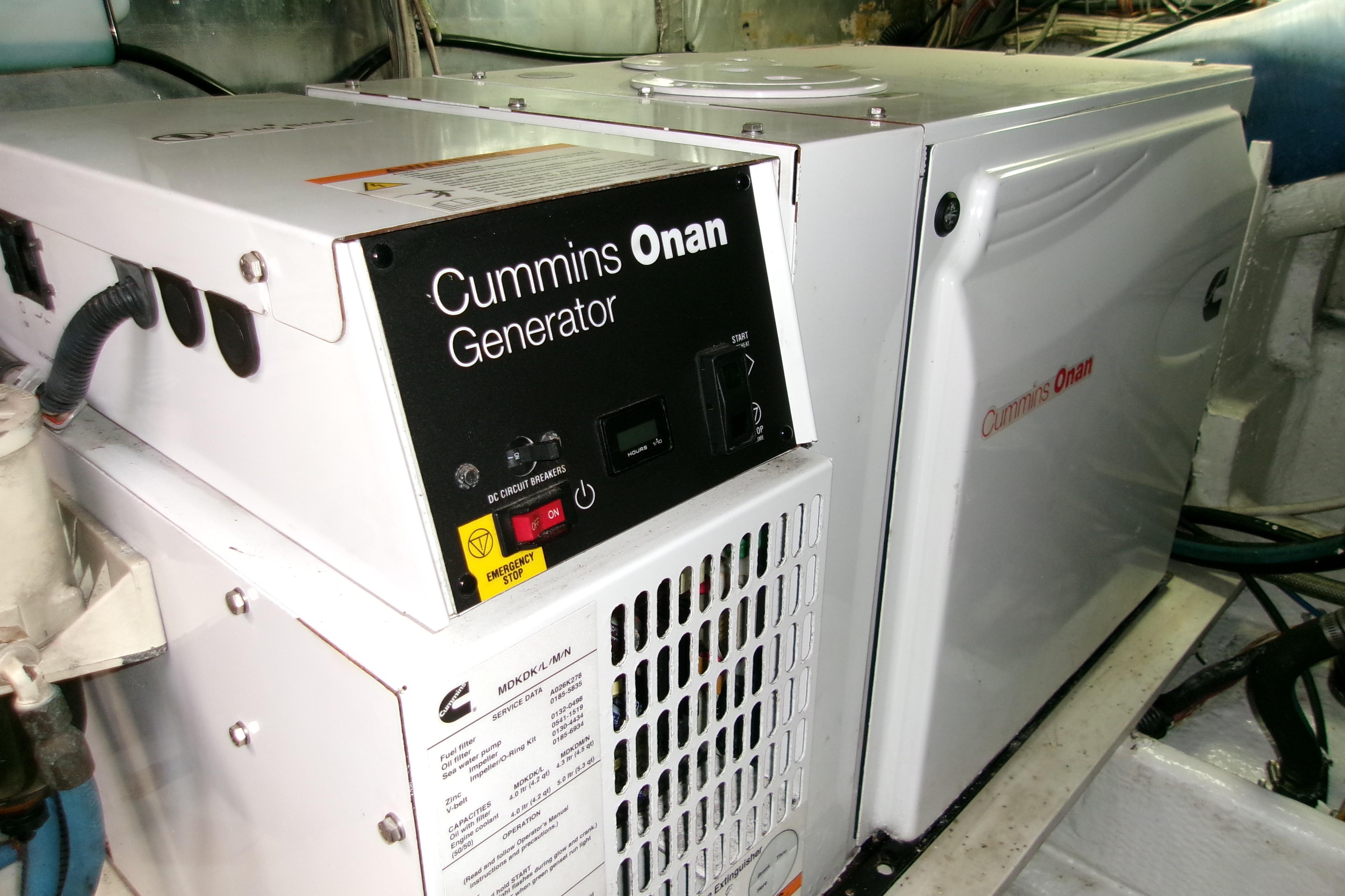 Cummins Onan generator in 1988 Viking 48 Convertible yacht engine room.