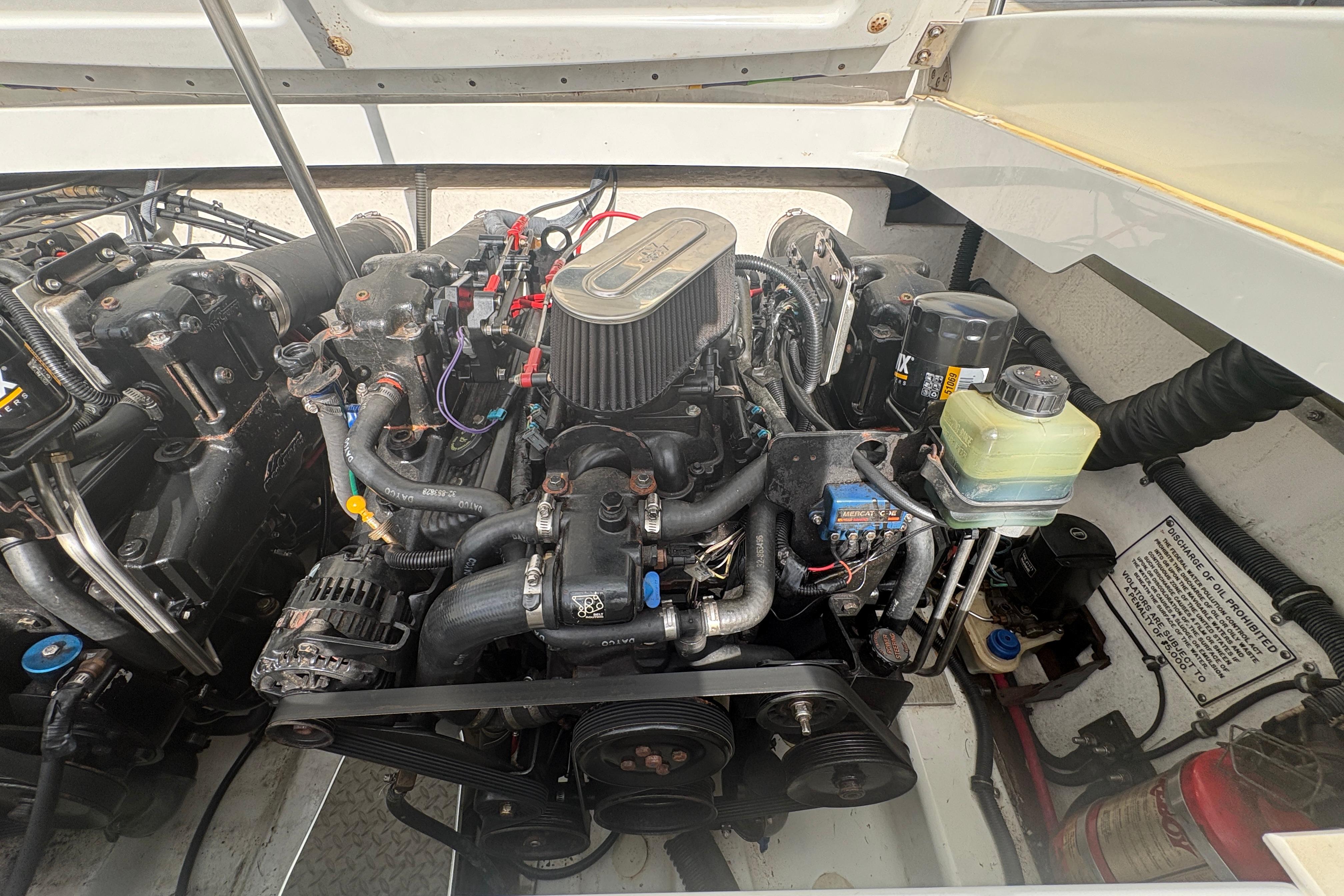 Engine compartment of a 2002 Formula 292 FASTech boat, showcasing detailed mechanical components.