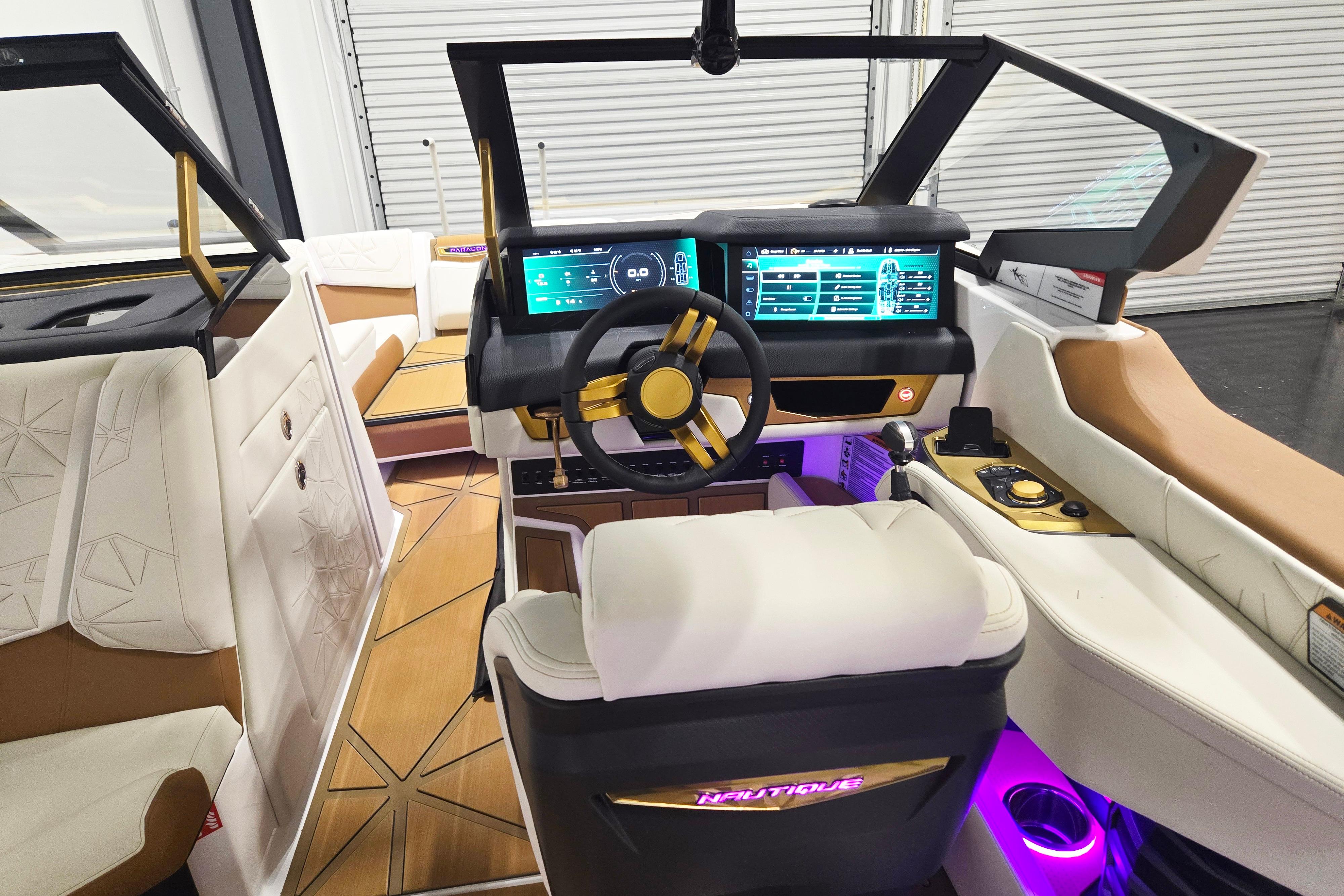 2026 Nautique Super Air Nautique G23 Paragon interior with advanced dashboard and luxurious seating.