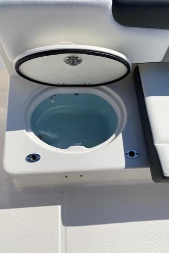 2024 Robalo R222 Center Console livewell with open lid.