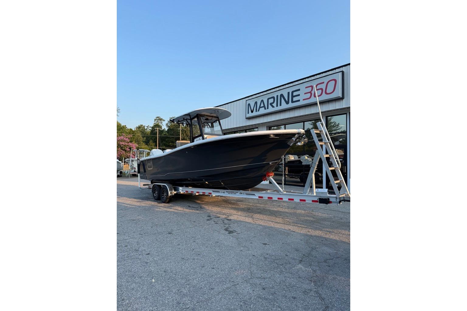 2026 Sea Hunt Gamefish 27 Coffin Box boat on trailer at Marine 360 dealership.