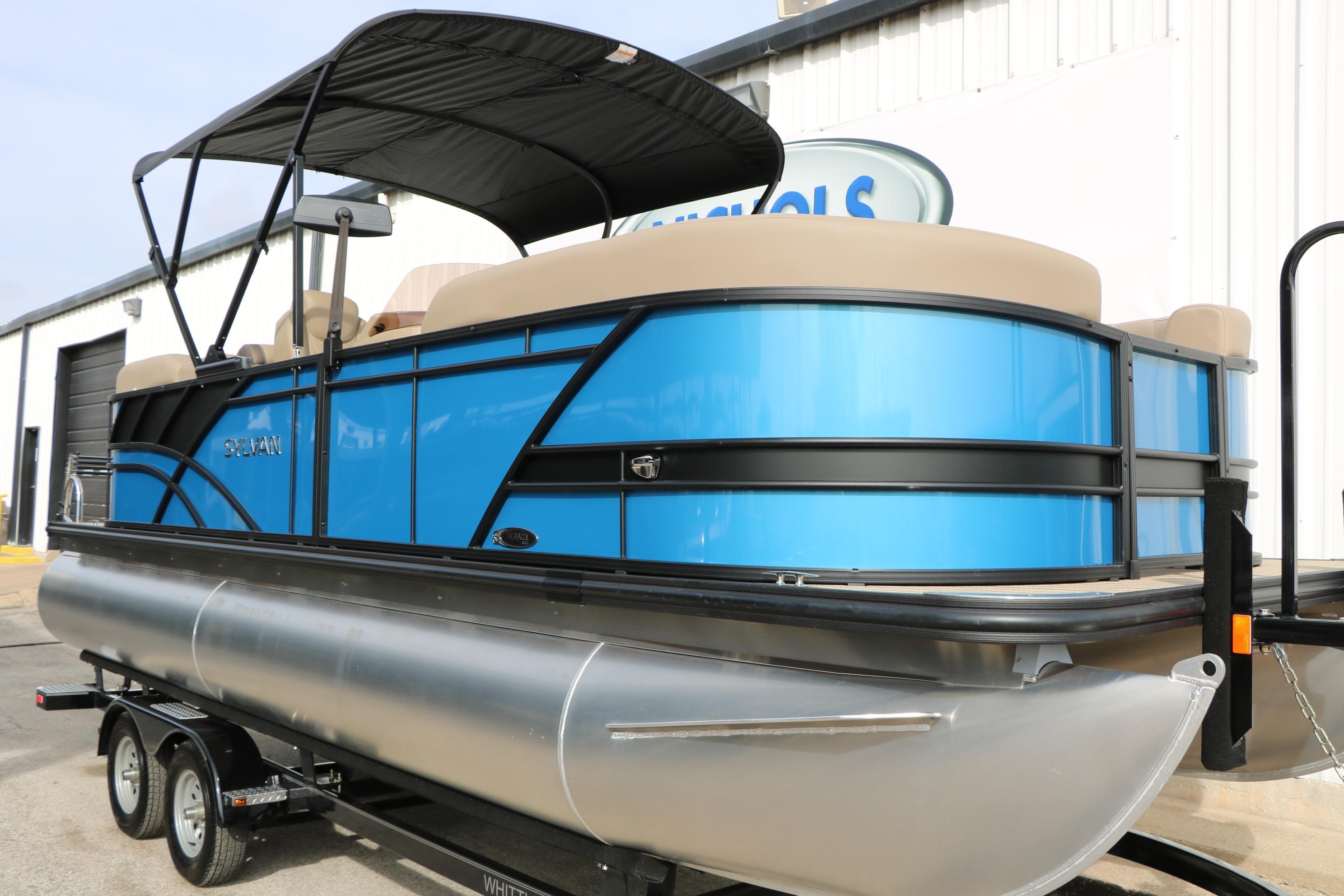 2026 Sylvan Mirage 822 LZ pontoon boat with blue exterior on trailer.