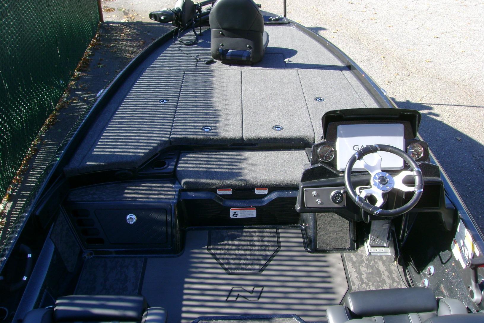 2026 Nitro Z21 XL Pro boat interior with steering wheel and control panel.