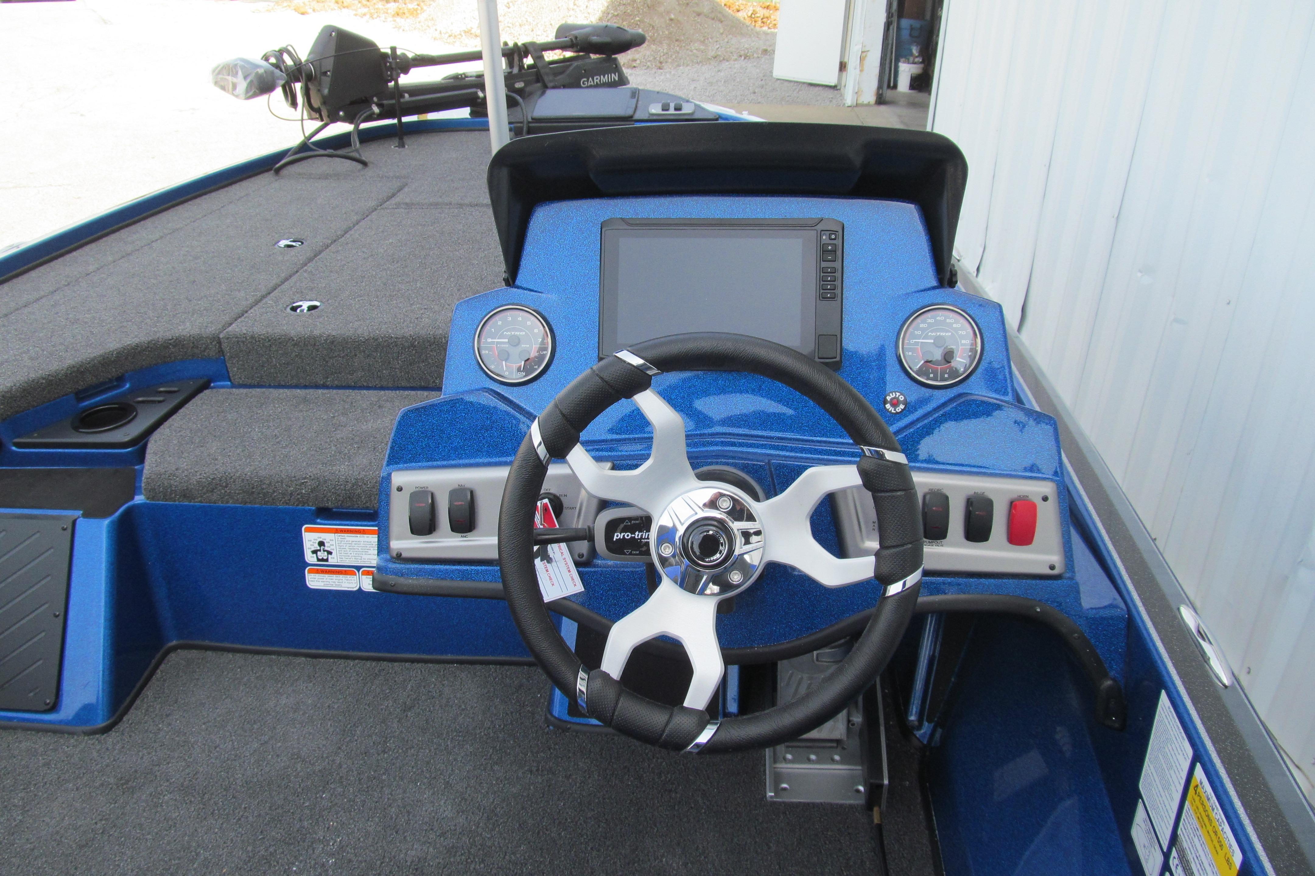 Steering console of a 2026 Nitro Z18 Pro boat with modern controls and display.