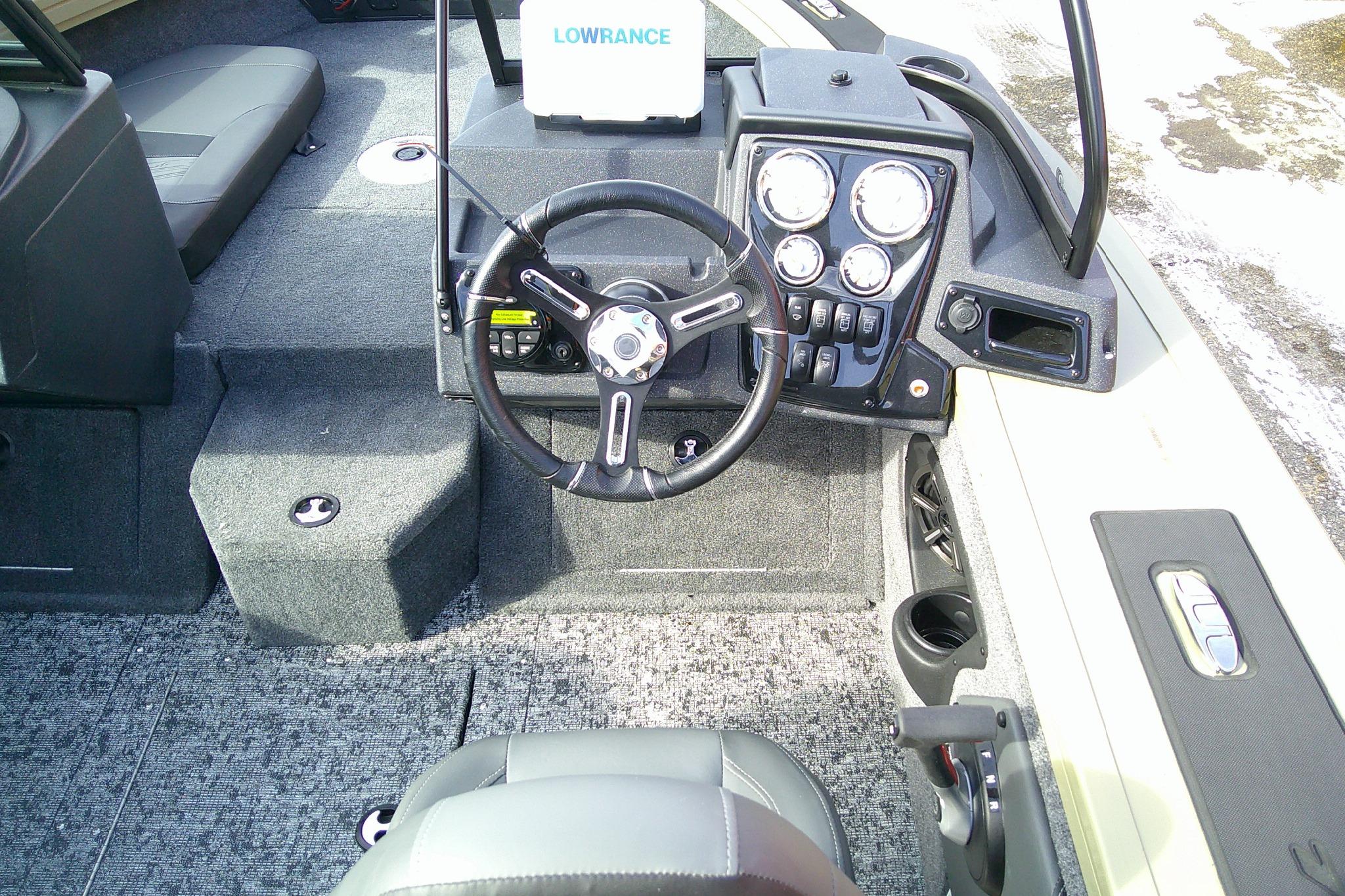 2026 Tracker Targa V-19 Combo boat interior with steering wheel and control panel.