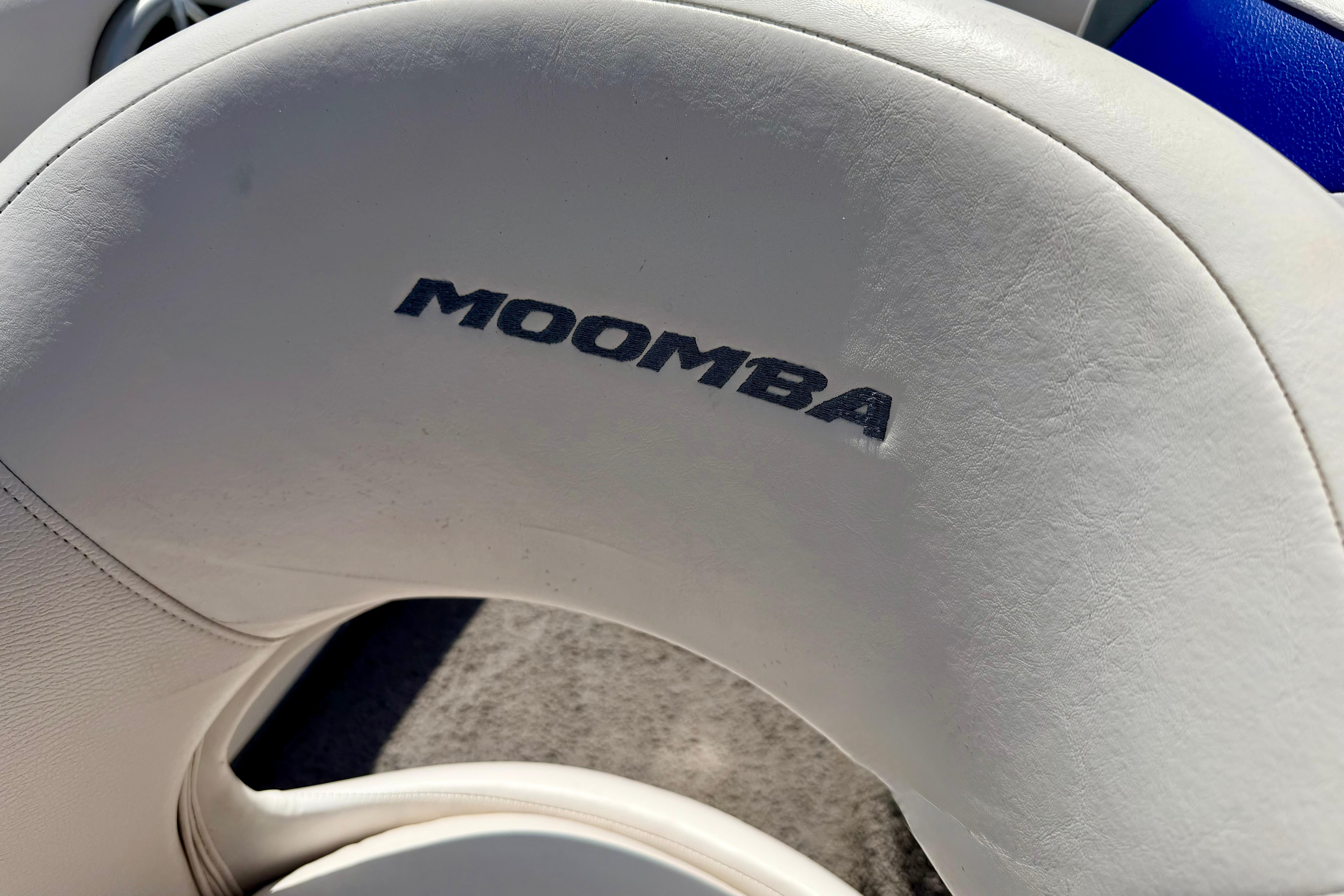 White Moomba Outback V 2008 boat seat with logo detail.