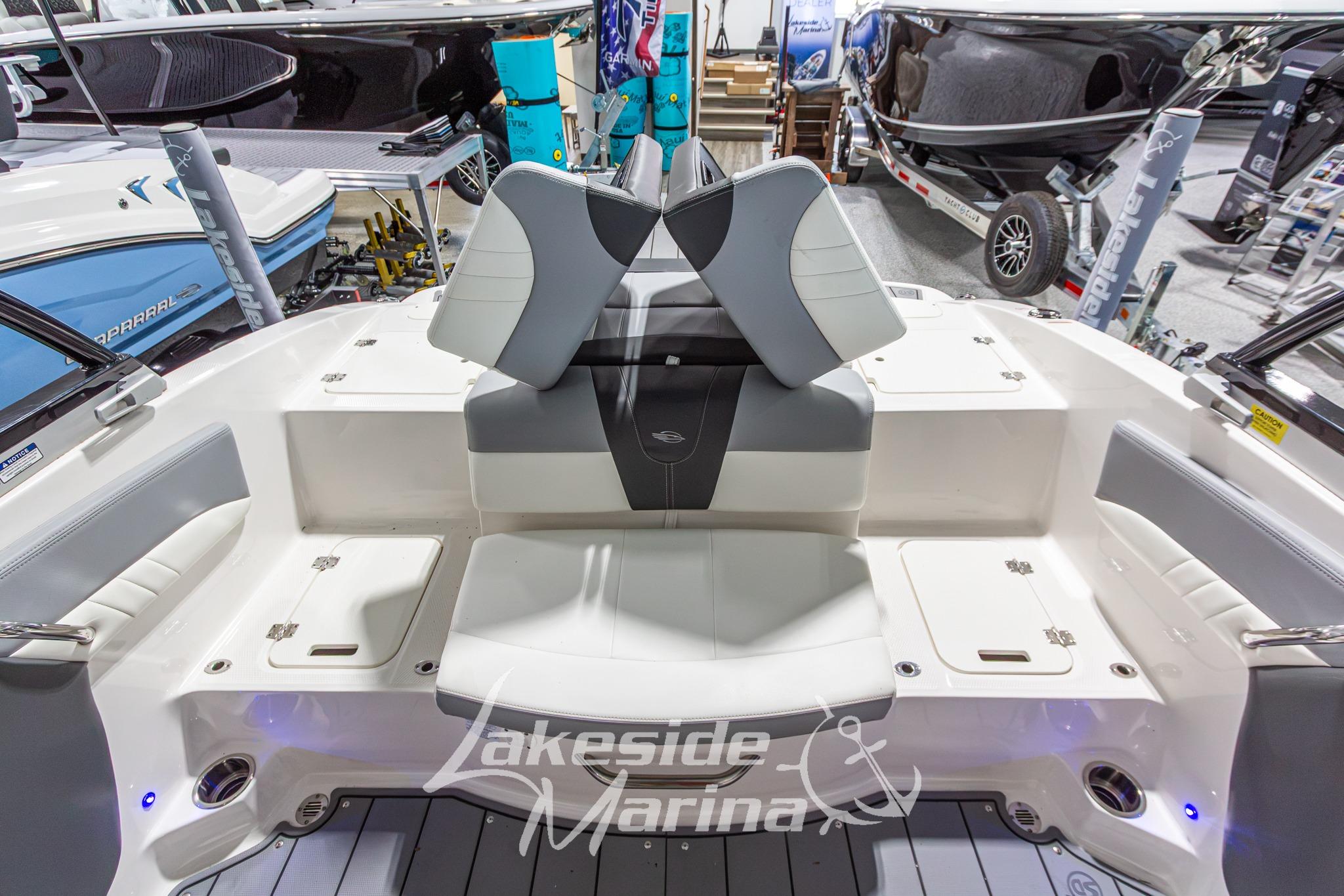 2022 Chaparral 21 SSi boat interior at Lakeside Marina, showcasing seating and storage.