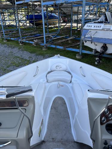 2005 Crownline 180 BR boat interior, docked in storage facility.