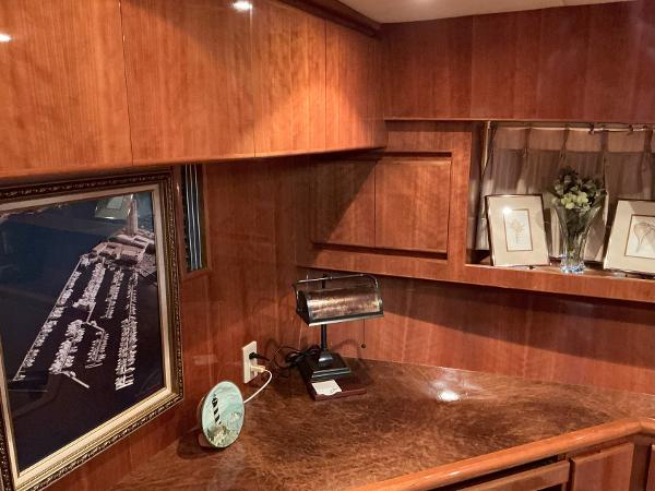 Luxurious interior of 2000 Novatec Islander 55 yacht with wood paneling and elegant decor.
