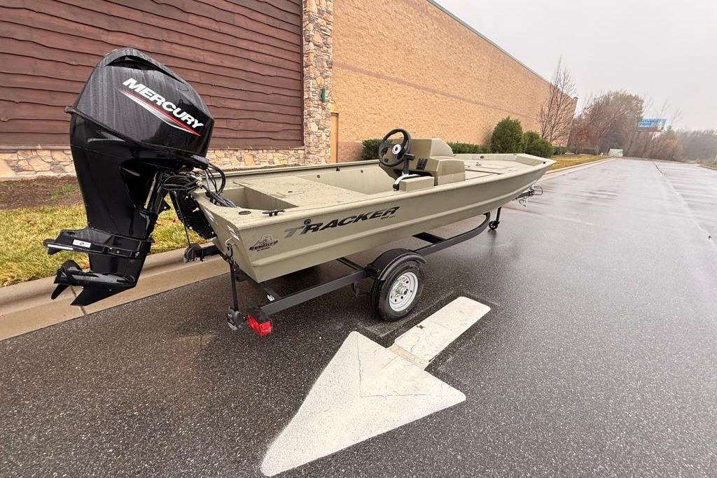 2026 Tracker Grizzly 1648 SC boat with Mercury engine on trailer.