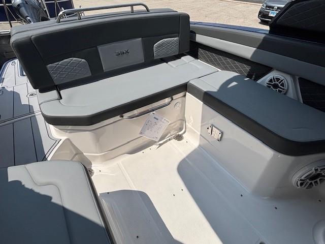 2026 Chaparral SSX 6 boat interior with gray seating and modern design.