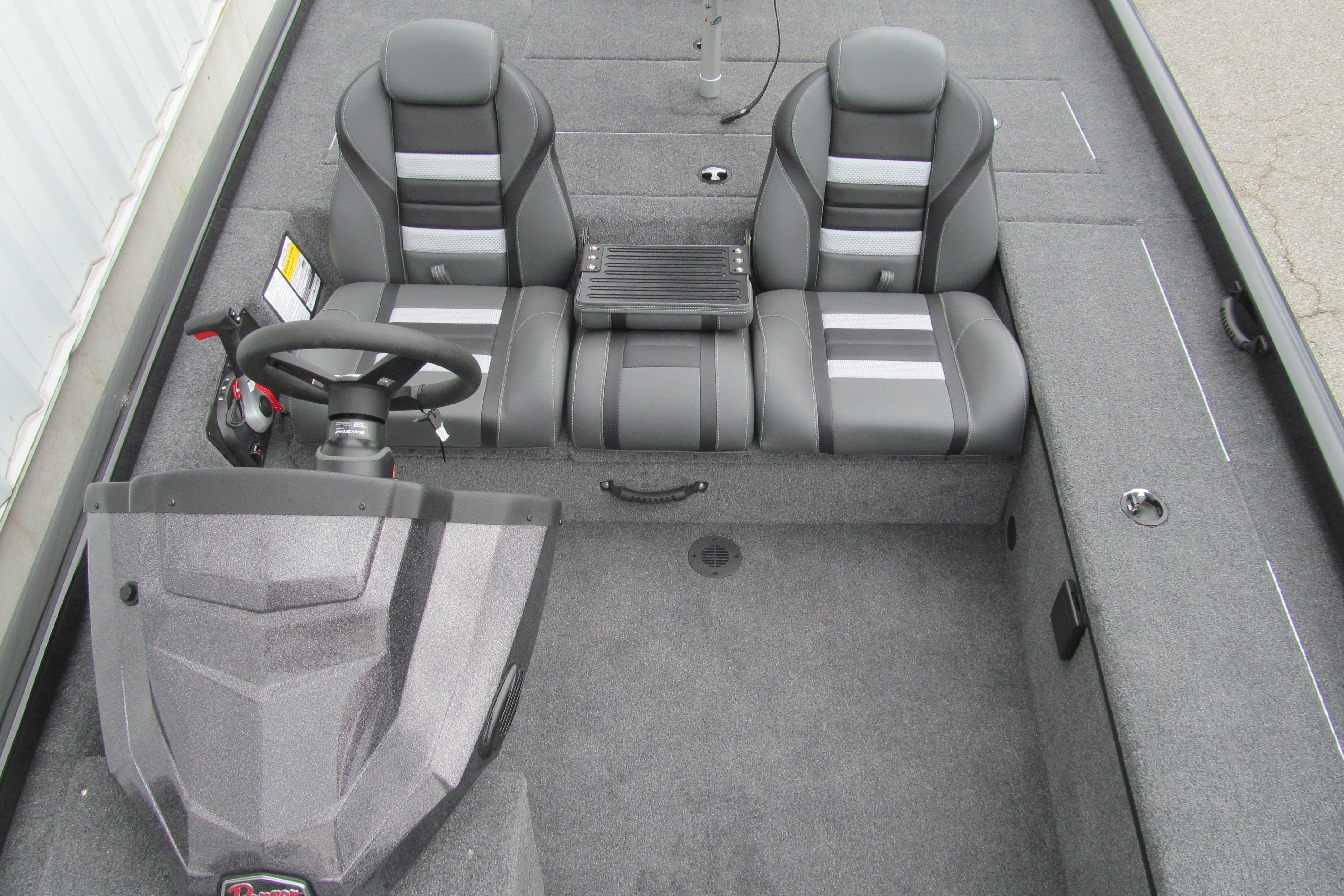 2026 Ranger RT188C boat interior with dual gray seats and steering console.