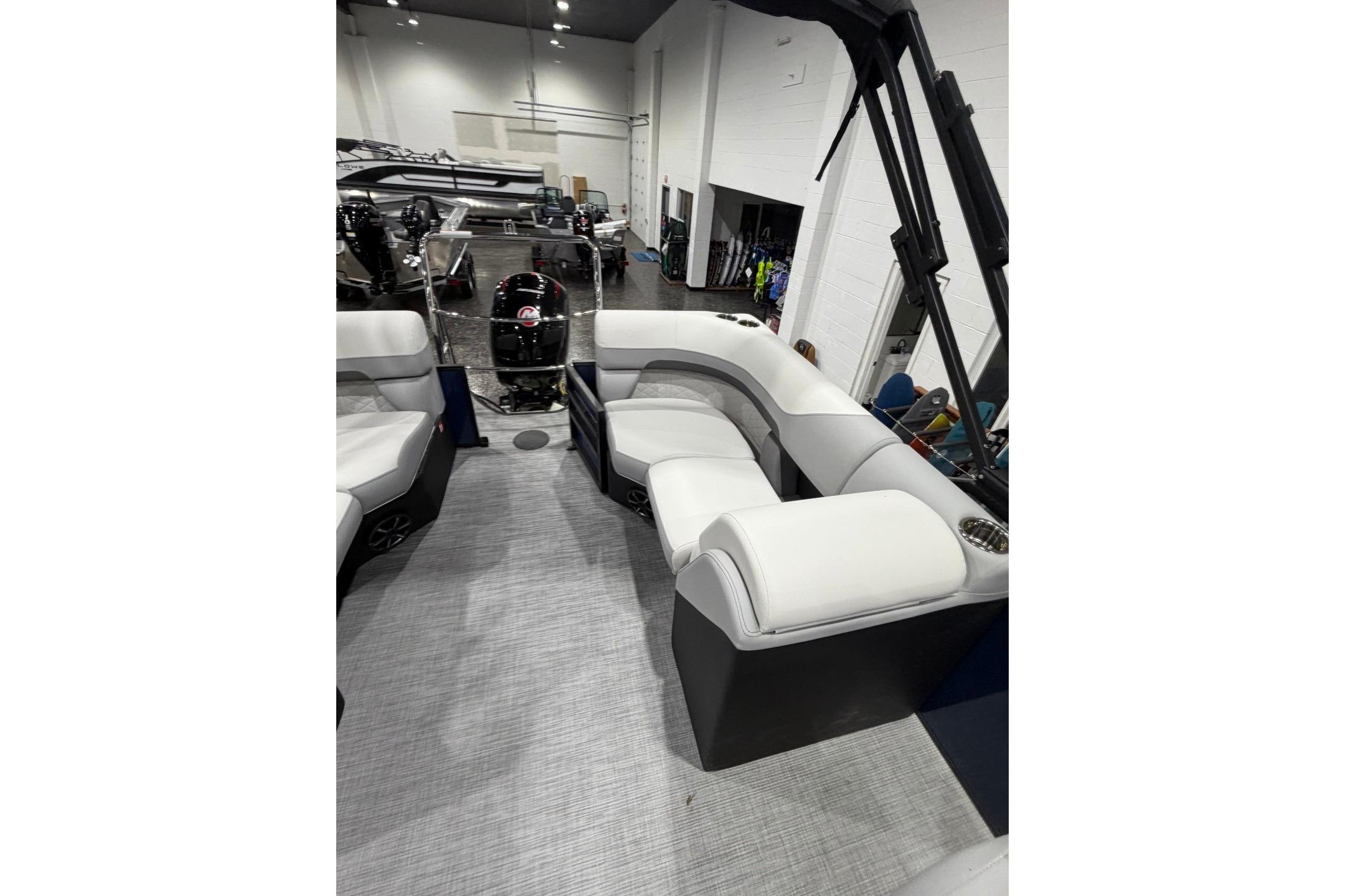 2026 Lowe SS 230 WT pontoon boat interior with white seating and modern design.