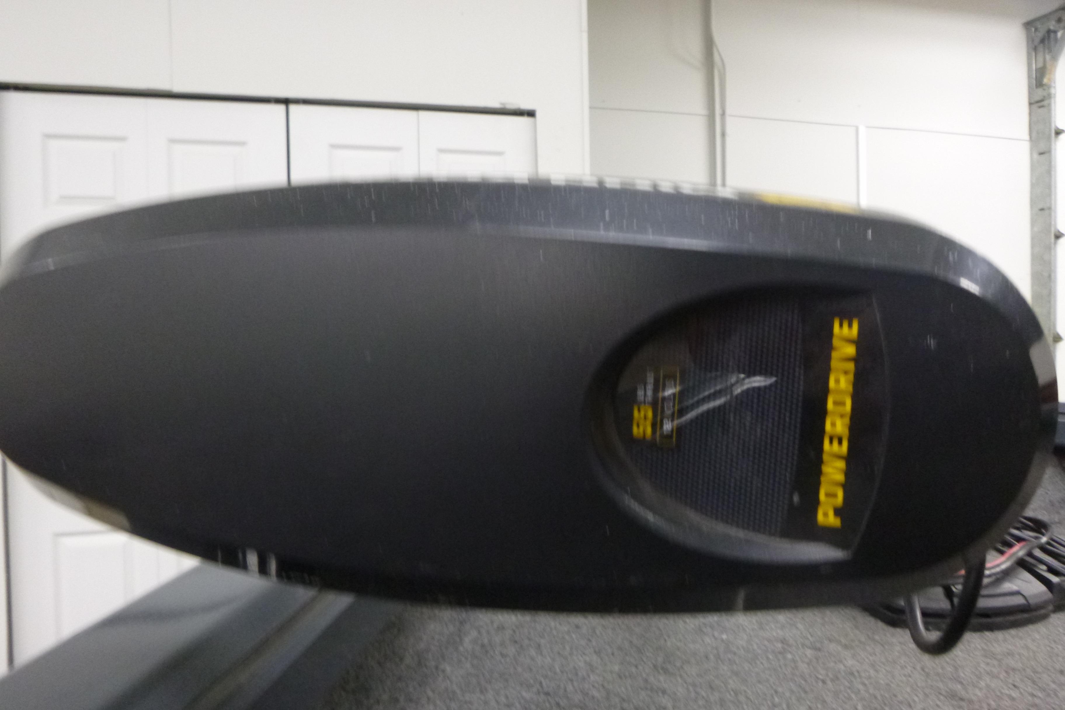 2021 Ranger VS1660 T boat with PowerDrive motor in a garage setting.