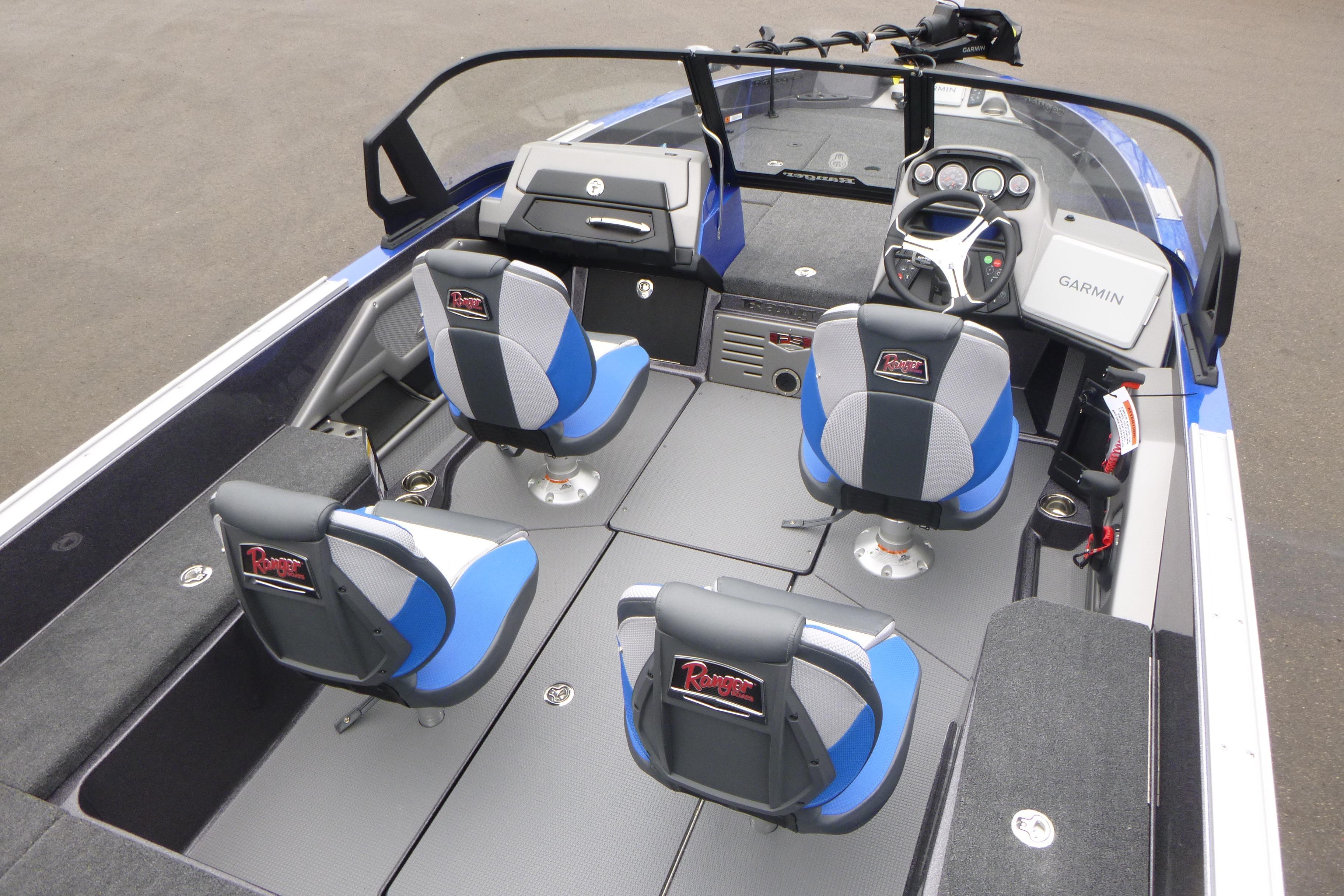 2026 Ranger 620FS Cup Equipped boat interior with four blue and gray seats, Garmin dashboard.