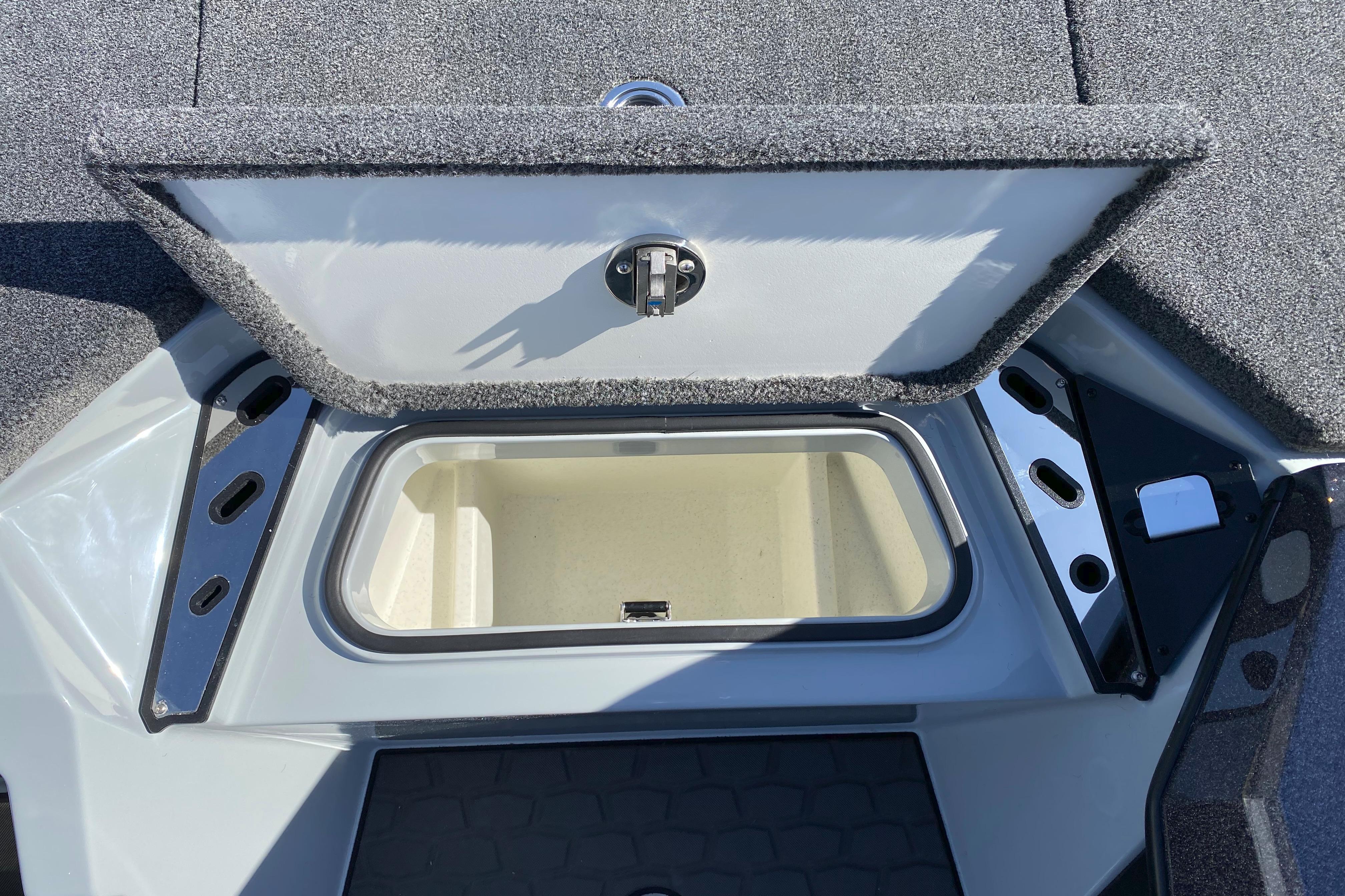 2026 Ranger Z519R boat storage compartment with open lid, showcasing interior space.