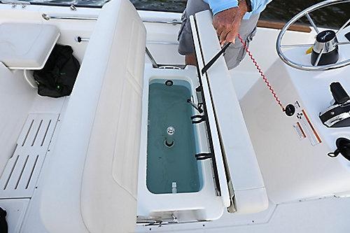 2026 Boston Whaler 170 Montauk boat interior with open storage compartment.