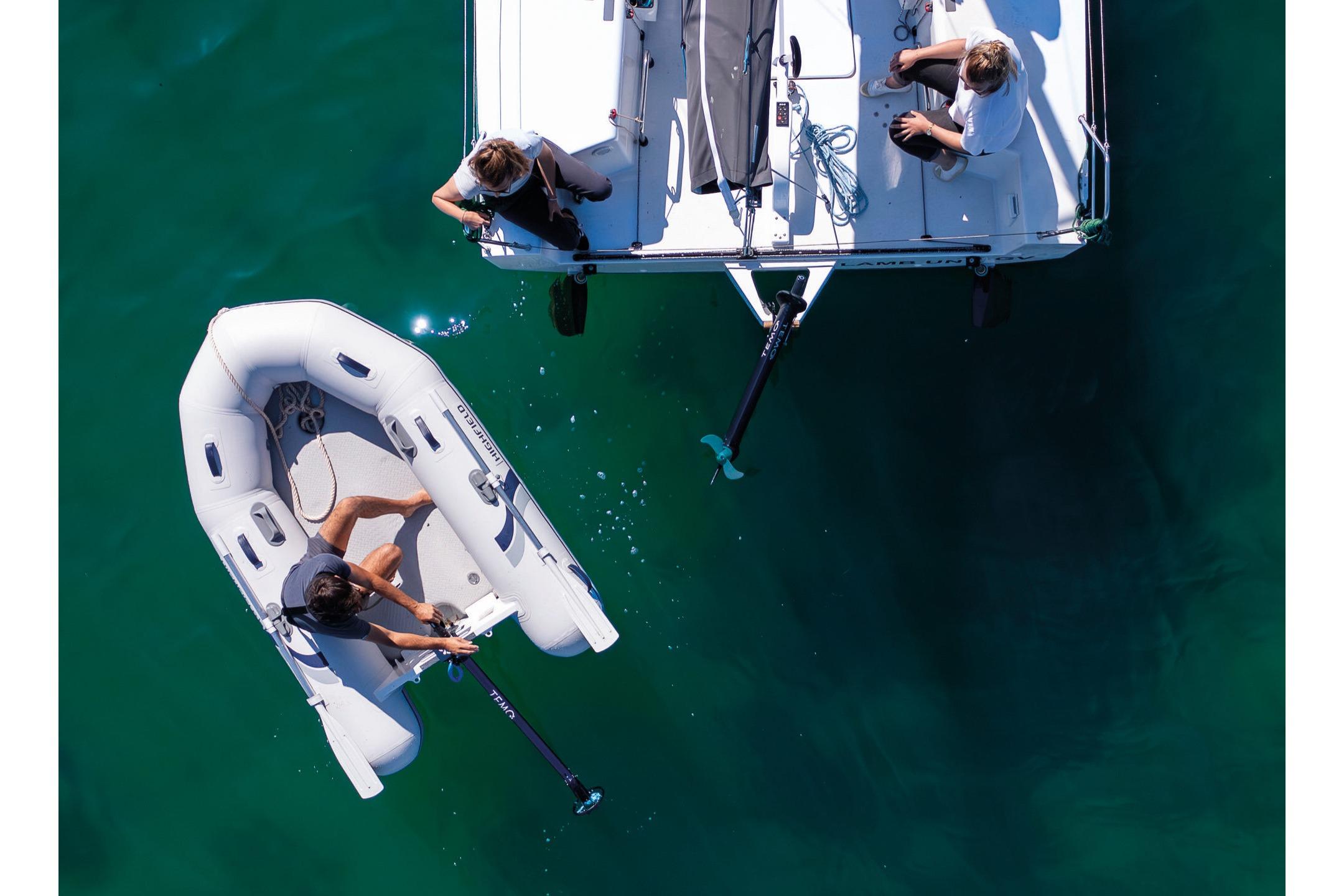 Aerial view of Highfield Roll-Up 230 KAM inflatable boat on water.