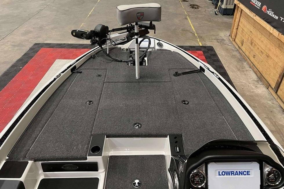 2026 Triton 18 TrX boat interior with fishing deck and Lowrance electronics.