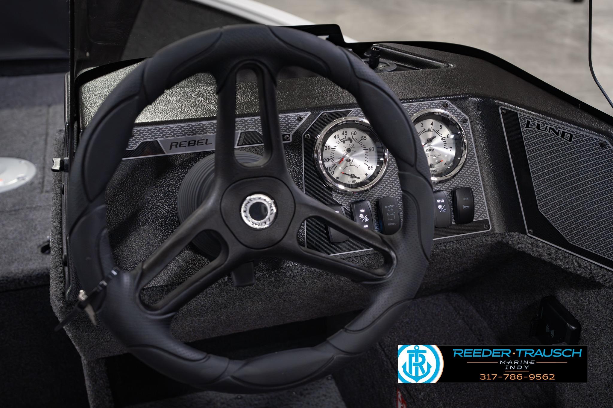 Steering wheel and dashboard of 2026 Lund 1650 Rebel XL SS boat.
