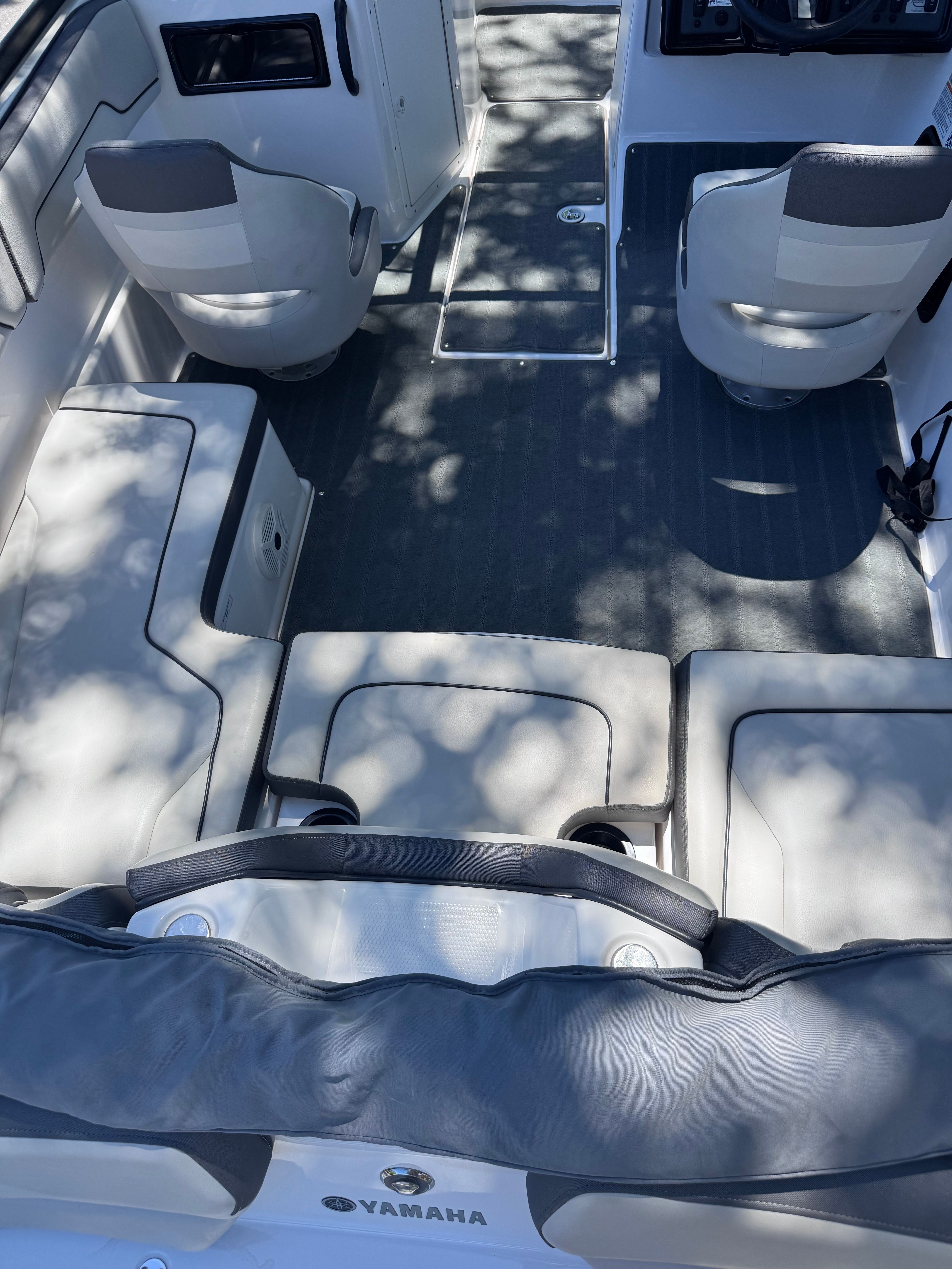 Interior of a 2020 Yamaha SX190 boat with gray seating.