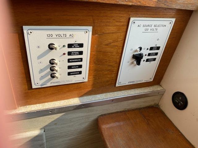 1972 Bertram Express electrical panel with 120 volts AC switches and source selection.
