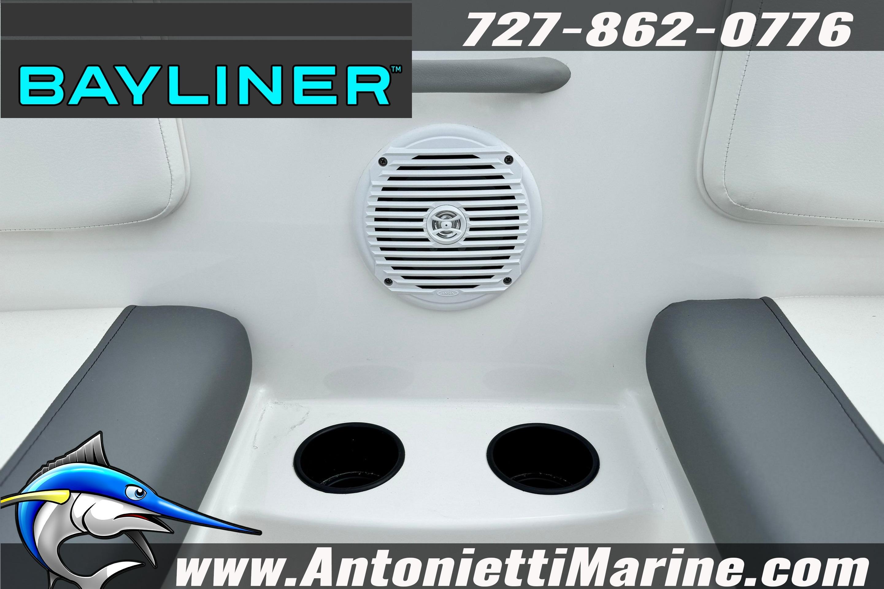 2026 Bayliner Element E16 boat interior with speaker and cup holders.