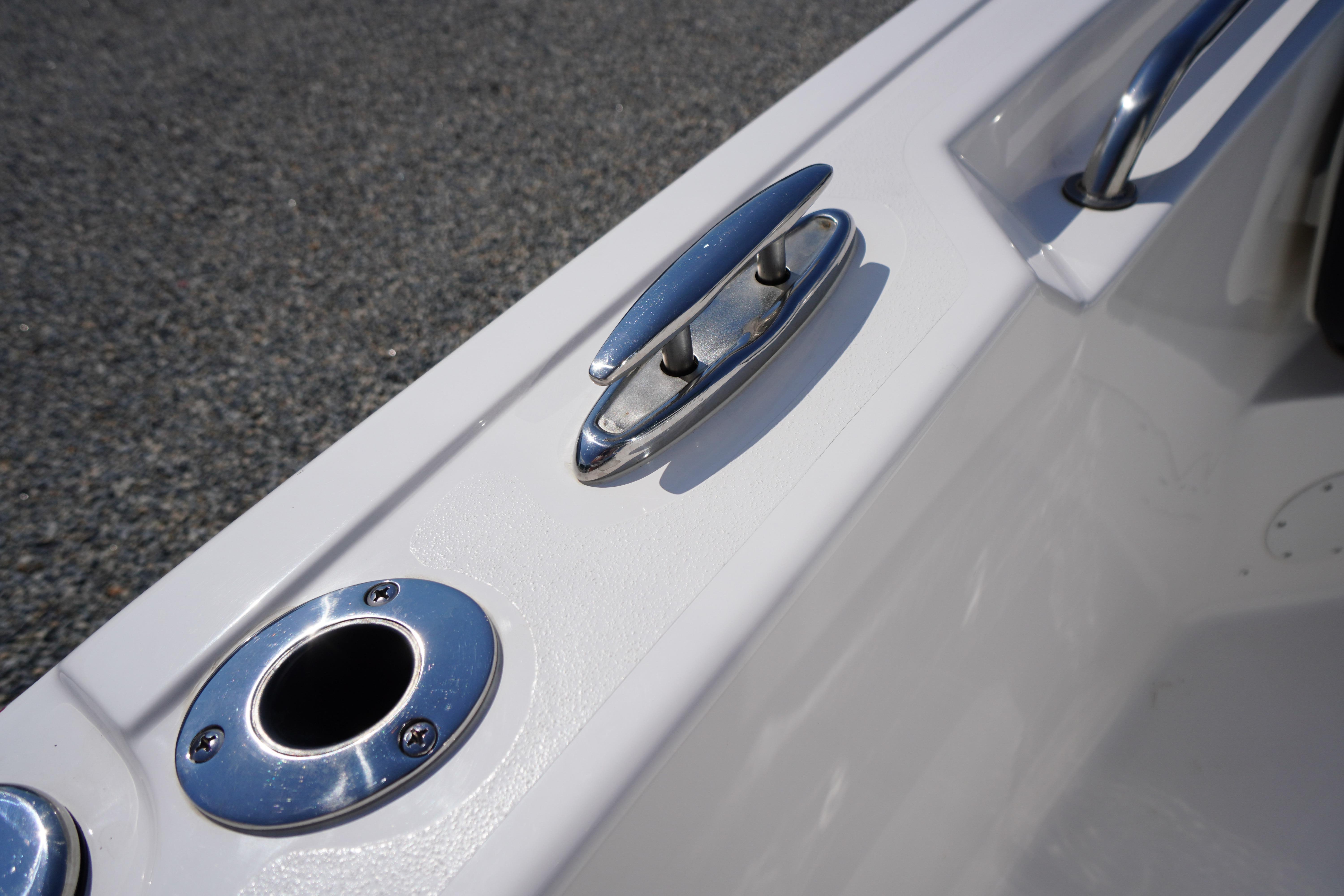 2025 Tidewater 232 SS boat cleat and rod holder on deck.