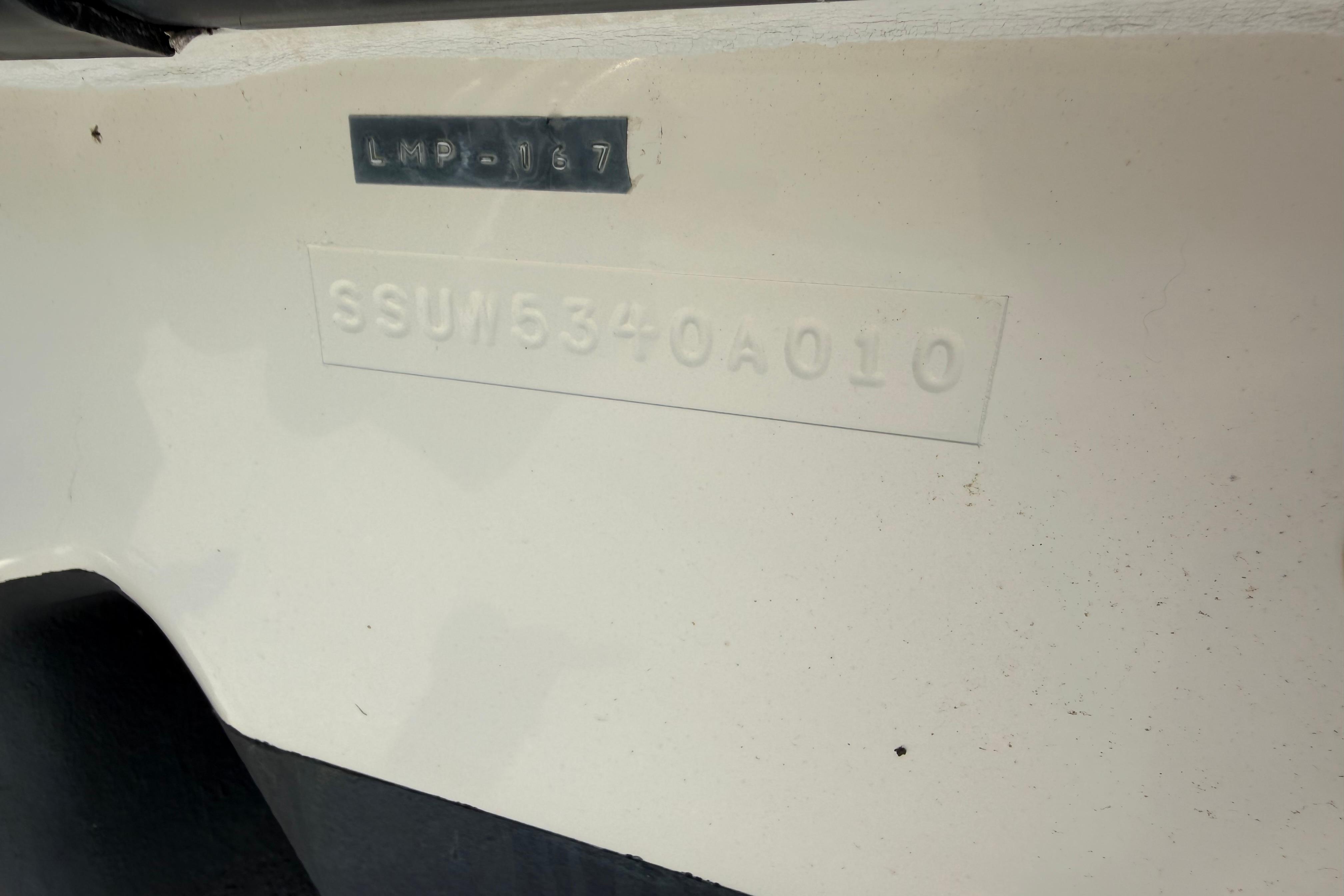 Hull identification number on a 2010 Pursuit OS 255 Offshore boat.
