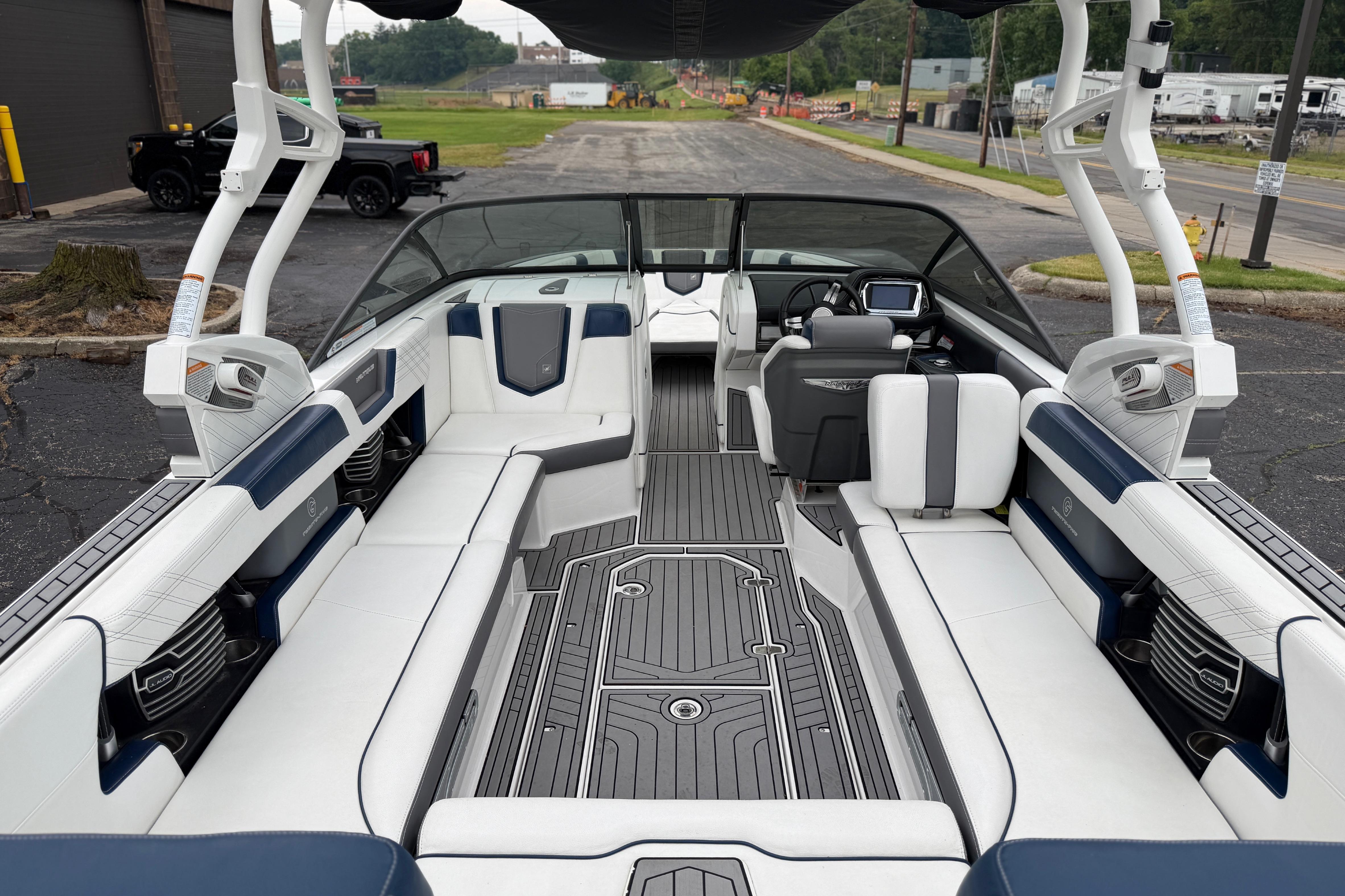 2016 Naitique G25 boat interior with sleek seating and modern dashboard design.