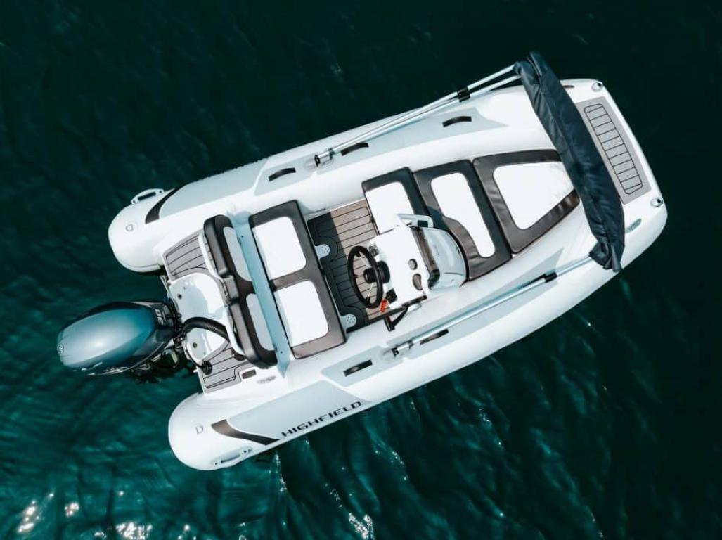 2024 Highfield Sport 330 boat on water, aerial view.
