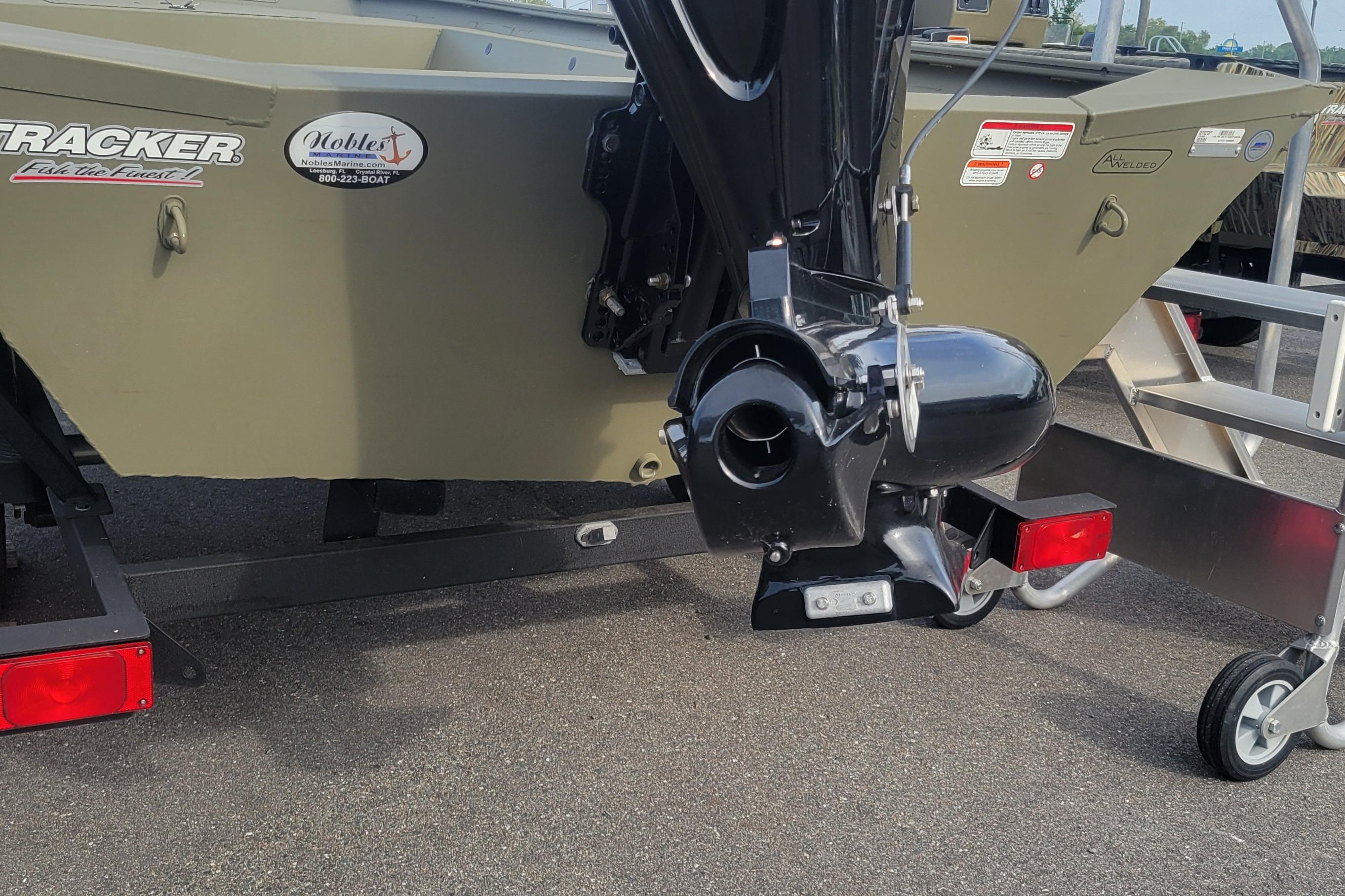2026 Tracker Grizzly 1754 Utility boat on trailer, featuring outboard motor.